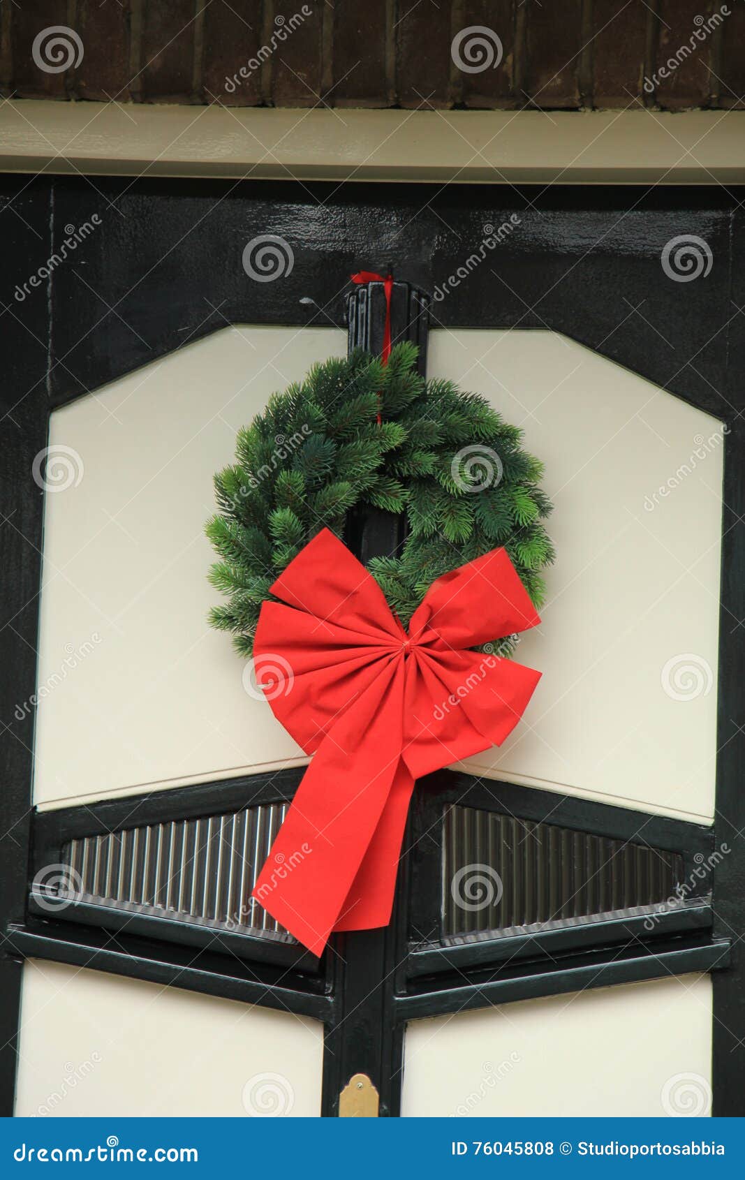 Christmas wreath with bow stock photo. Image of ribbon 76045808