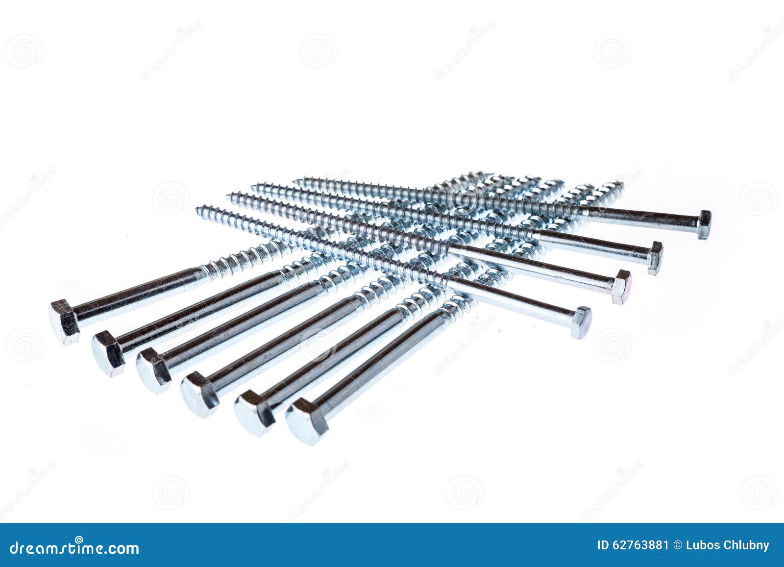 Chrome Screws On The Counter Of A Hardware Store. Background Of The
