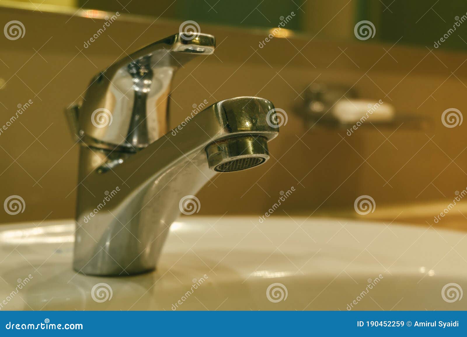 Chrome Faucet with Flowing Water in the Bathroom Stock Image Image of