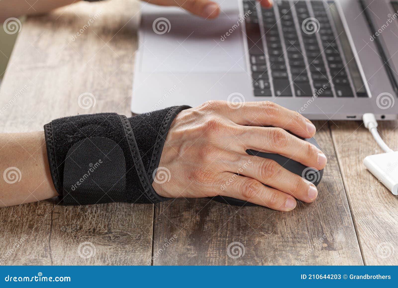 Chronic Trauma To the Wrist Joint in People Using Computer Mouse Stock