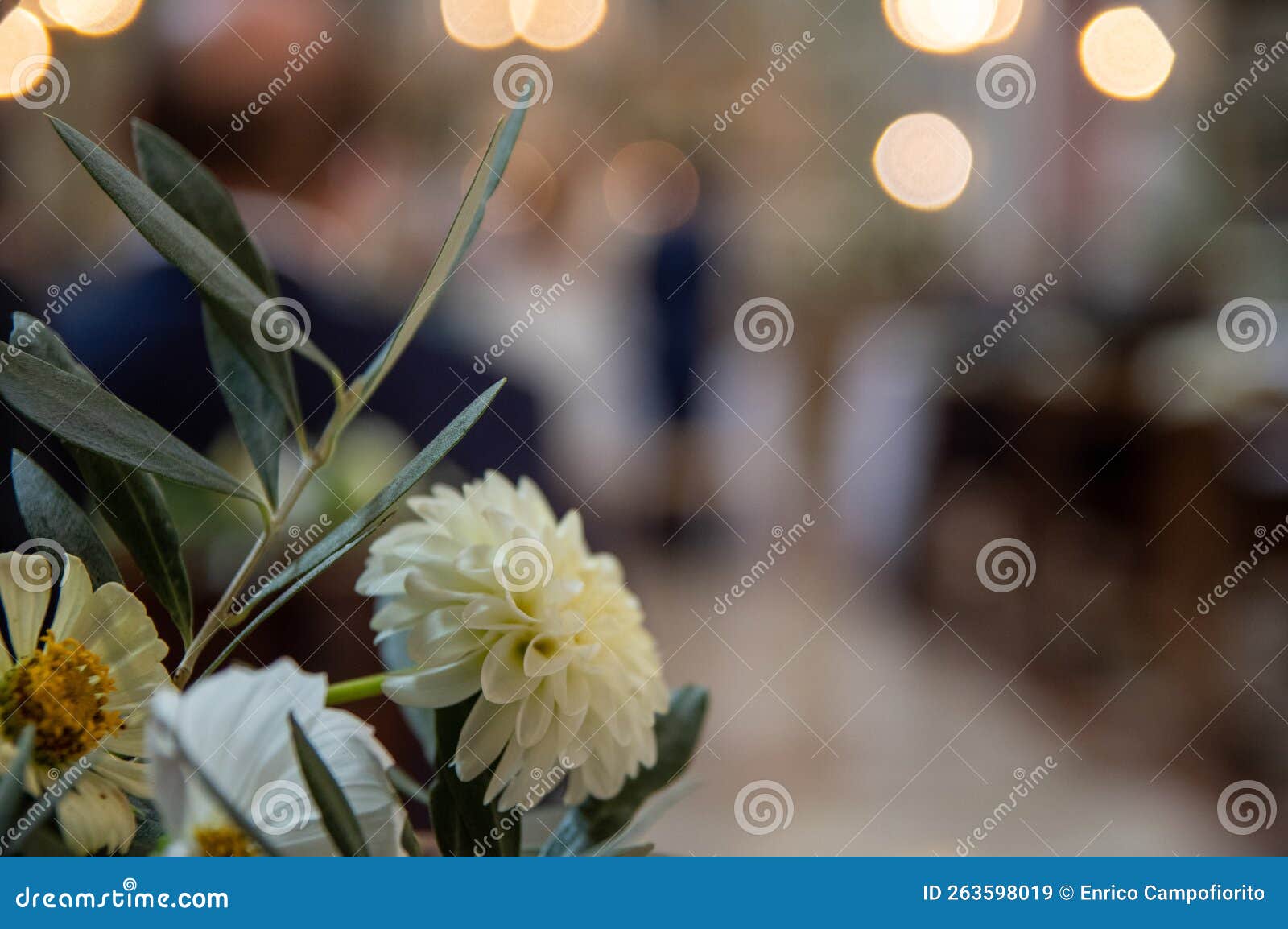 chrysanthemums, daises and olive leafs bouquet