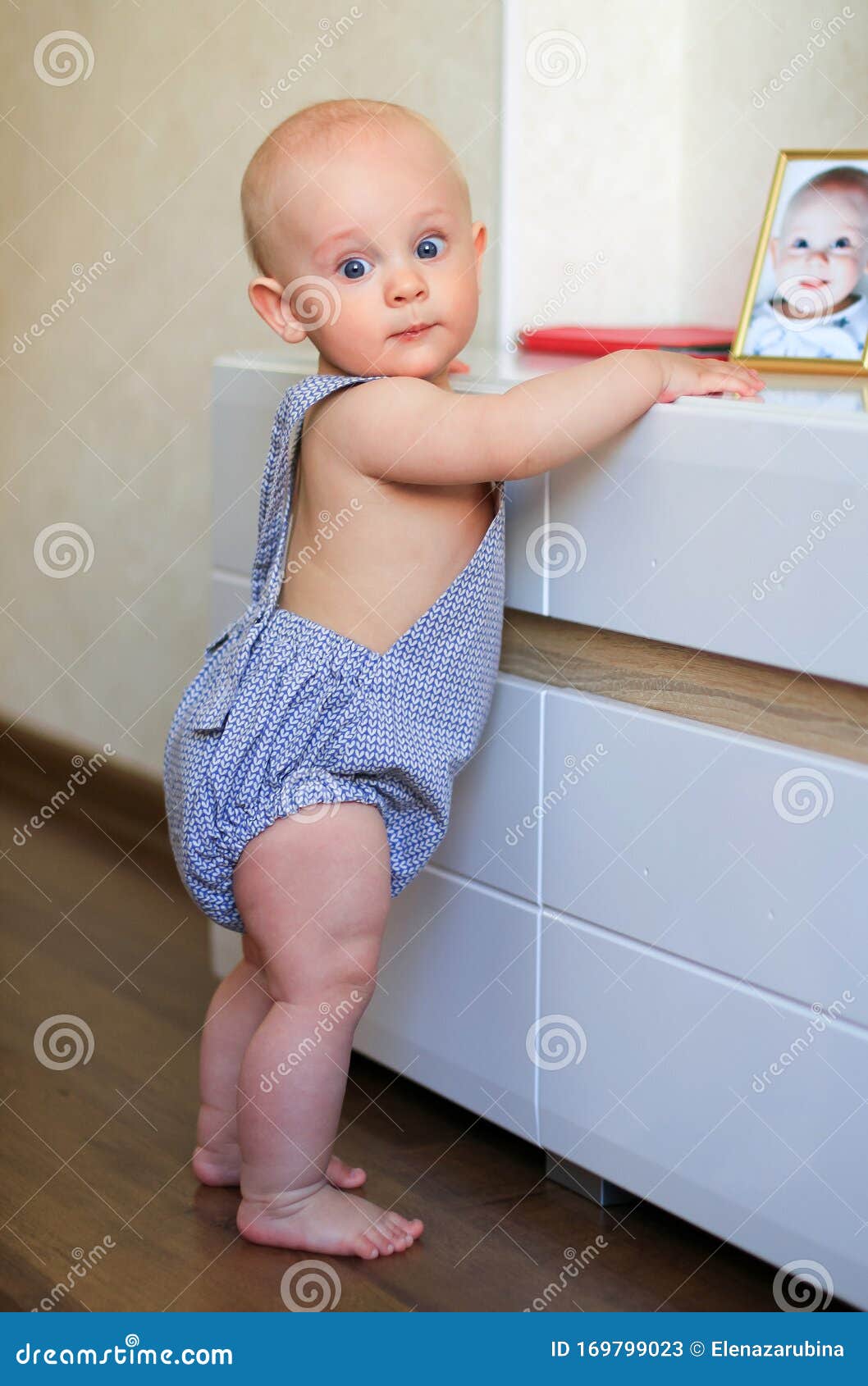 baby learning to stand