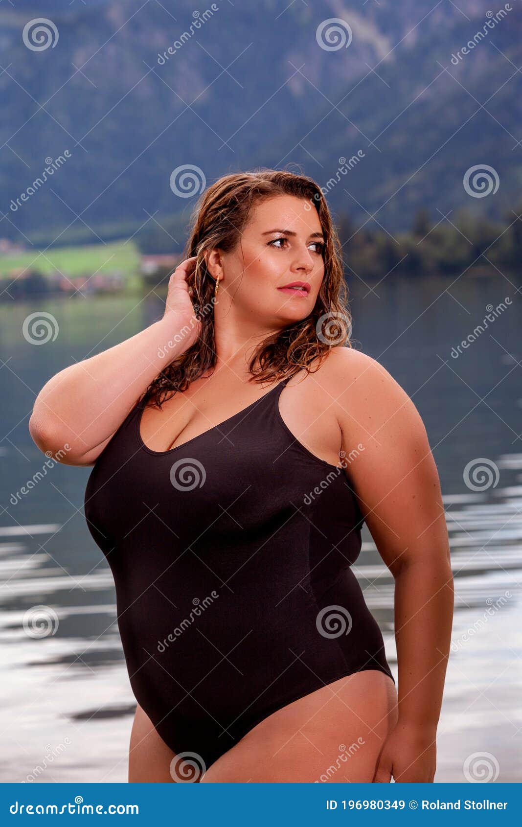 chubby-woman-blond-hair-black-swimsuit-beautiful-chubby-woman-swimsuit-196980349.jpg