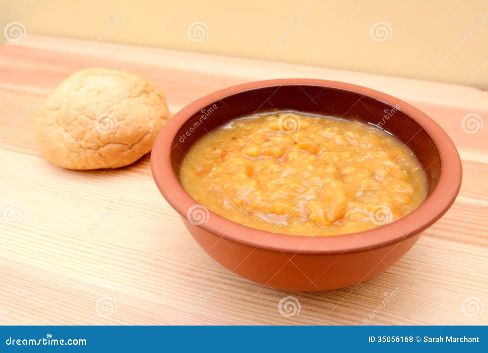 Chunky Vegetable Soup with a Bread Roll Stock Photo Image of table