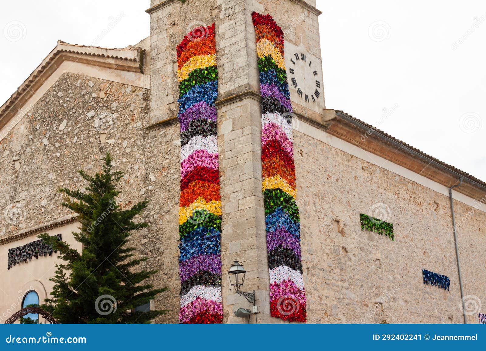 church, decorated with colorful flowers, on 