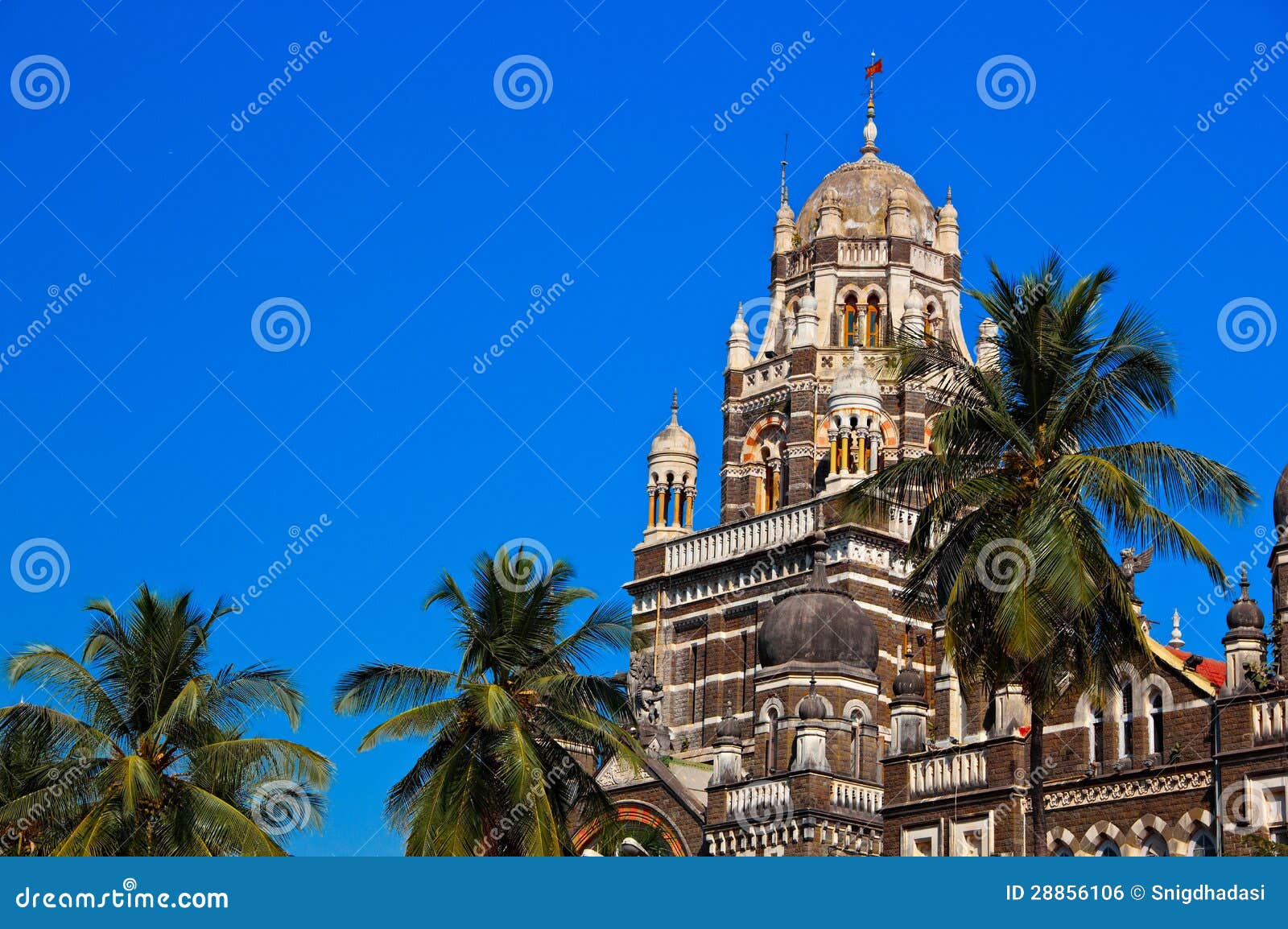 Church Gate. A church in Mumbai that gave a name to one of its railway stations. Famous sightseeng place. Historical building in English style. Typical architecture of old Mumbai on the background of blue sky.