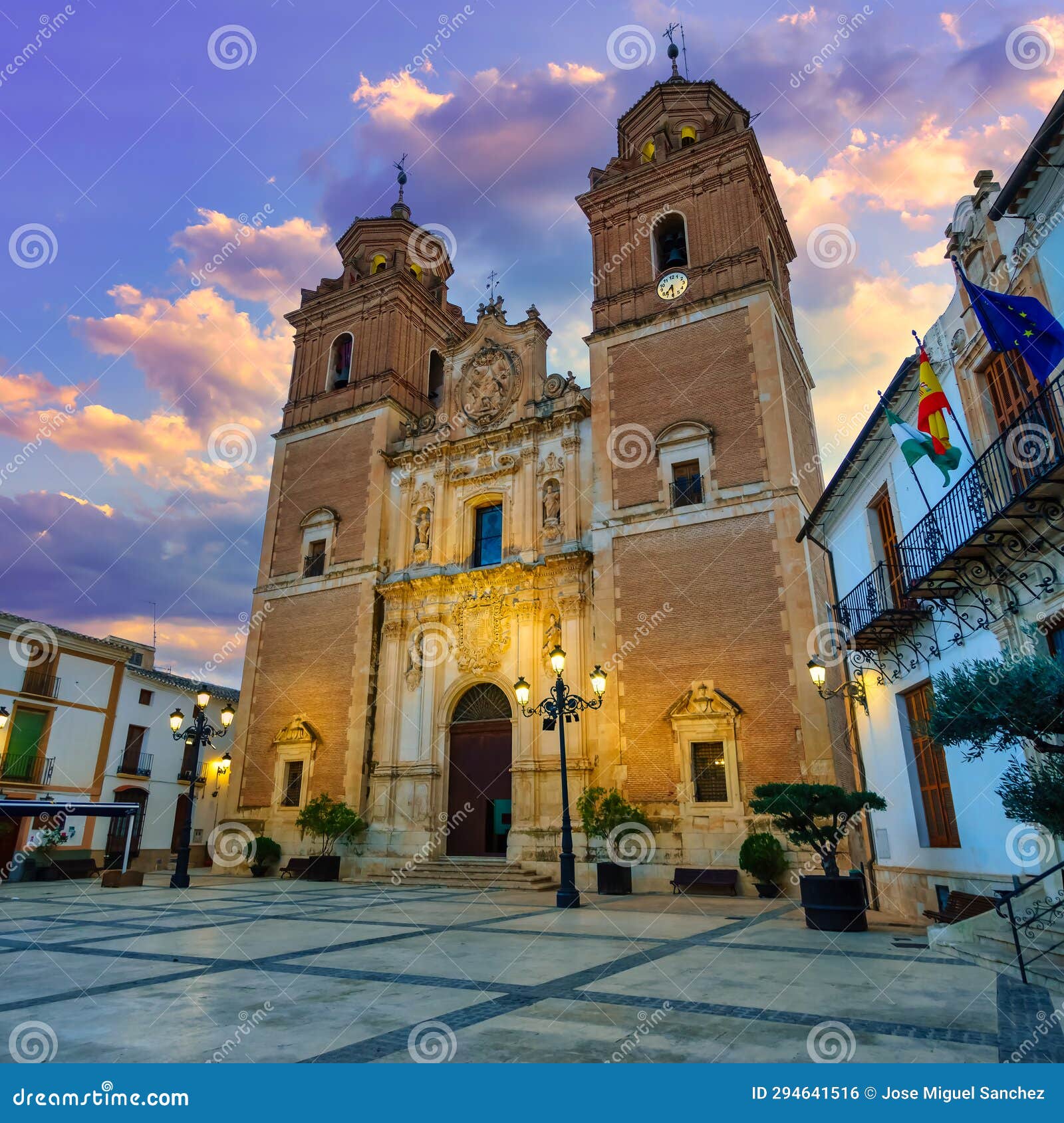 church of the immaculate virgin at sunset with lights on, velez rubio, almeria, spain.