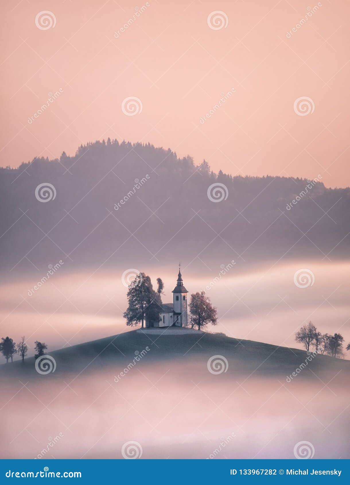 church of saint tomas, slovenia emerging from fog