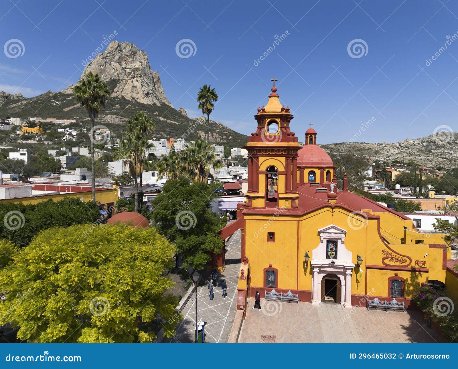 in the town of bernal the main church and the monolith