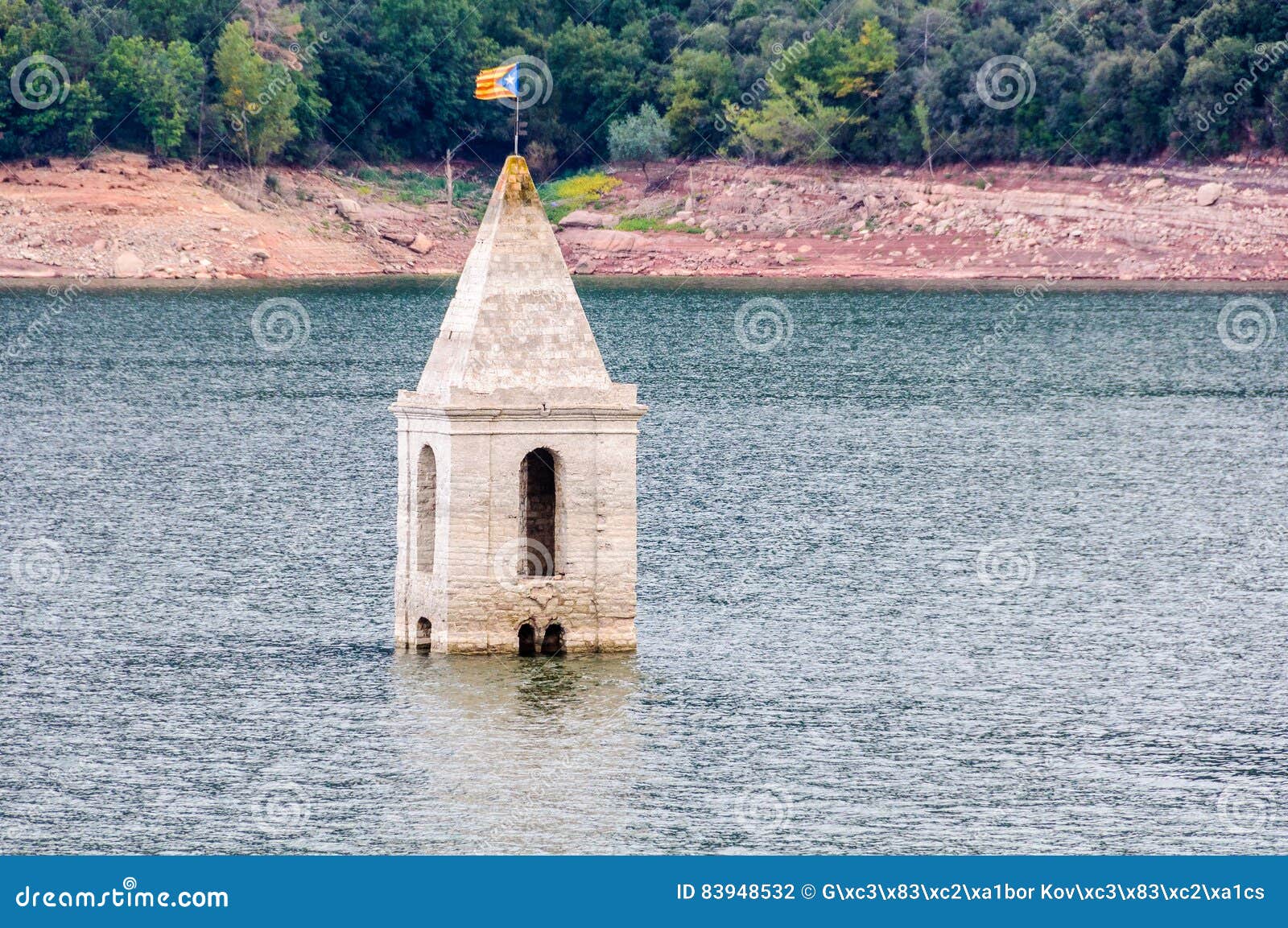 church tower in sau reservoir, catalonia, spain