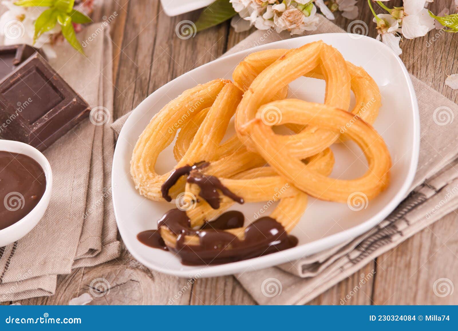 Churros with Chocolate Dipping Sauce. Stock Photo Image of delicious