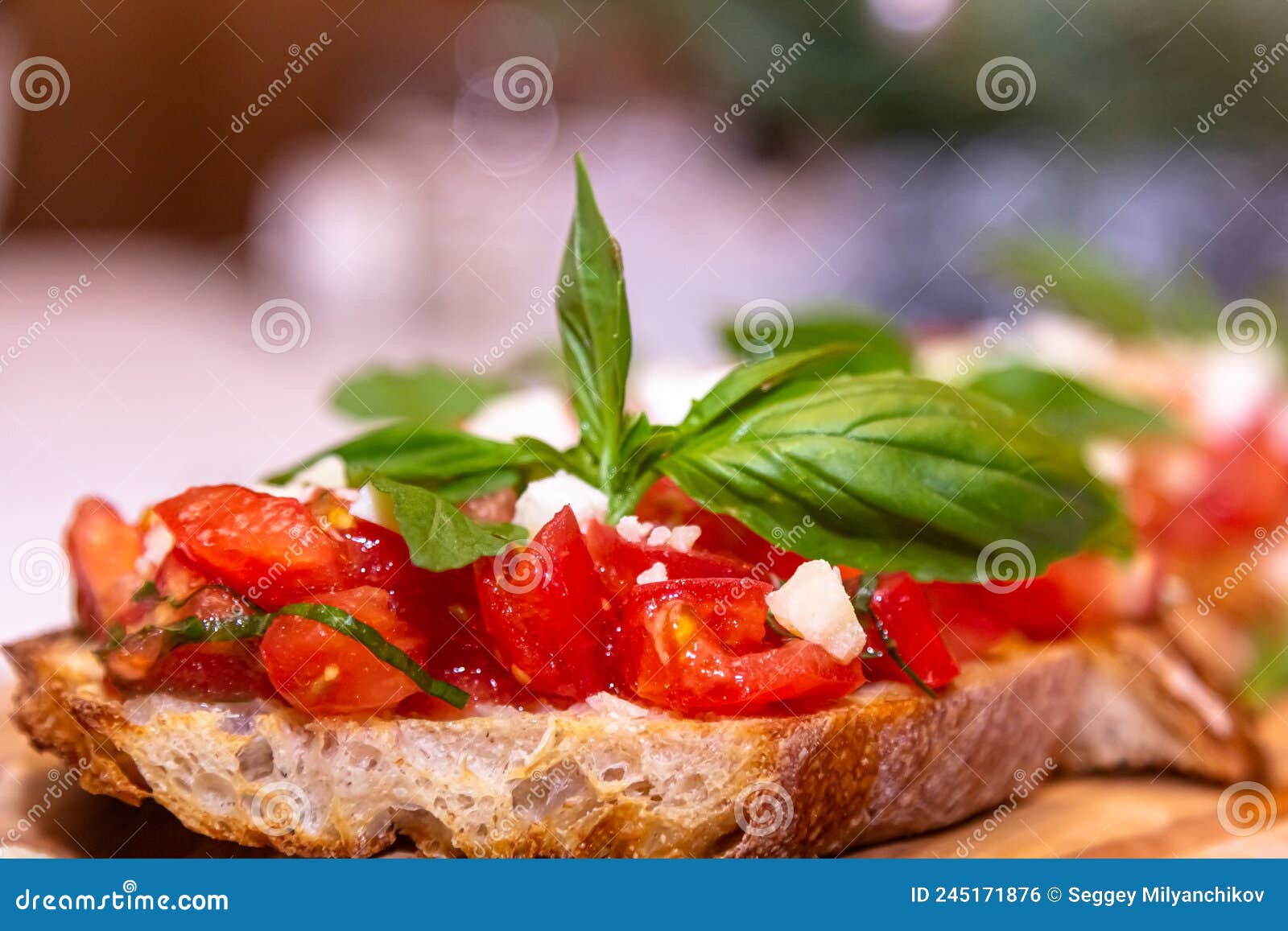 Ciabatta Bruschetta with Tomatoes, Mozzarella and Basil Stock Photo