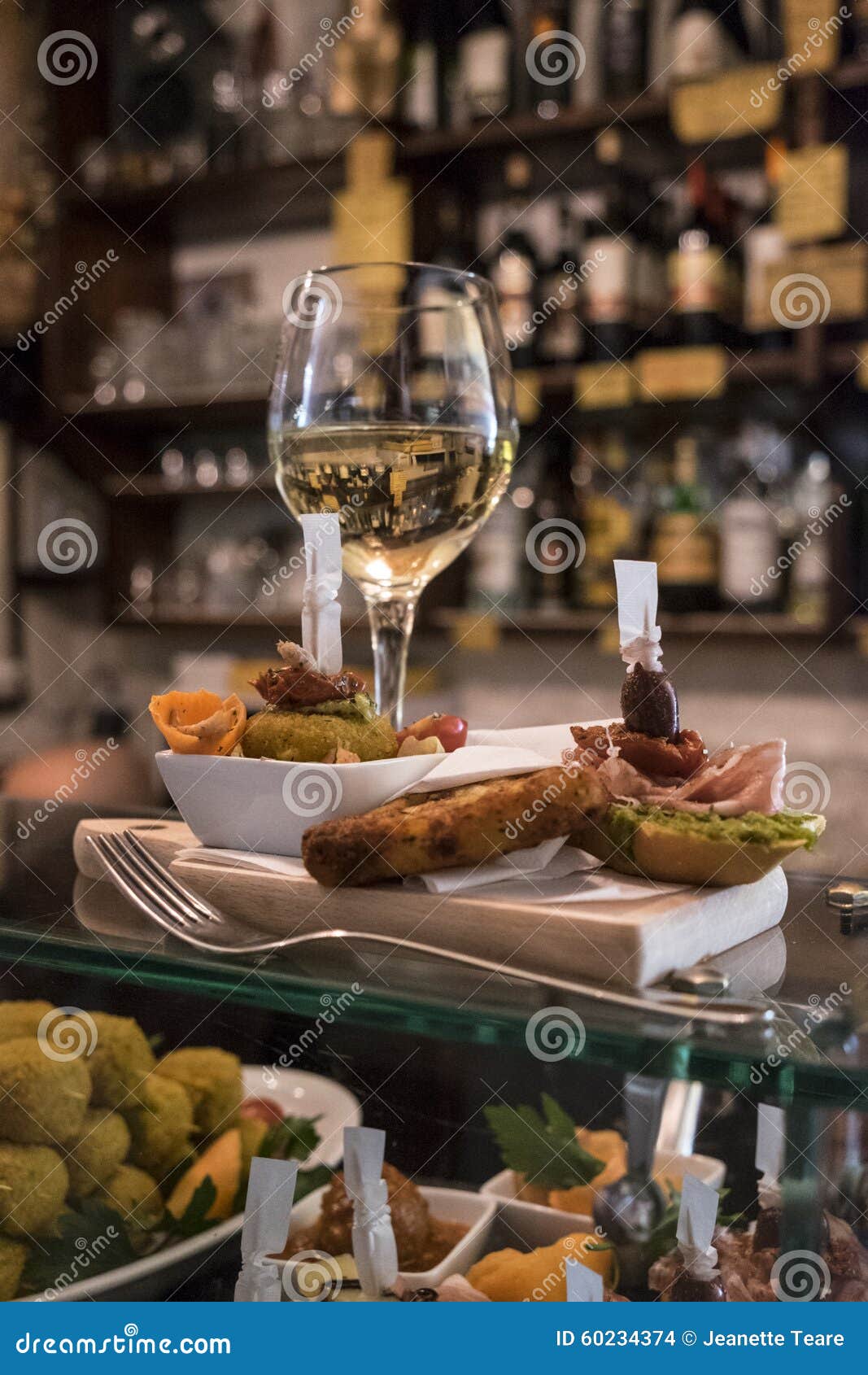 cichetti and wine at a venetian osteria