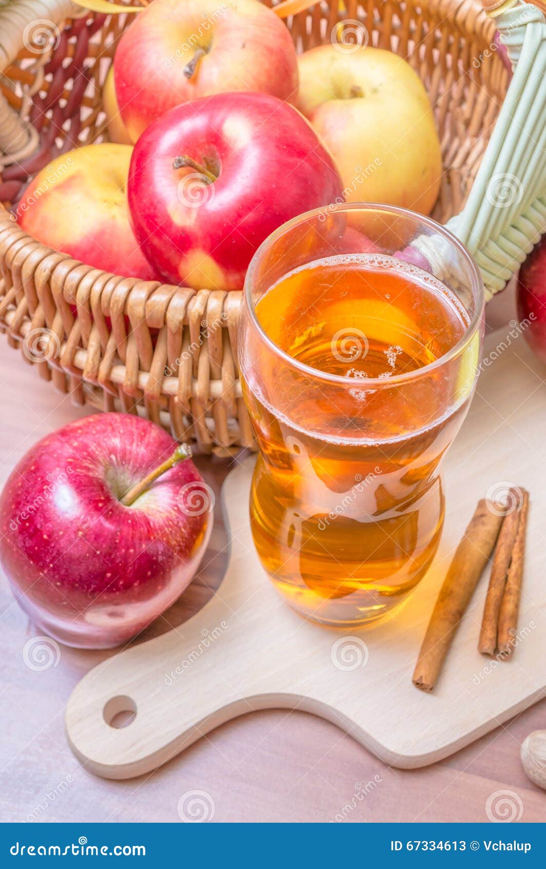 Cider Alcohol Hot Apple Drink and Apples on Wooden Table Stock Image