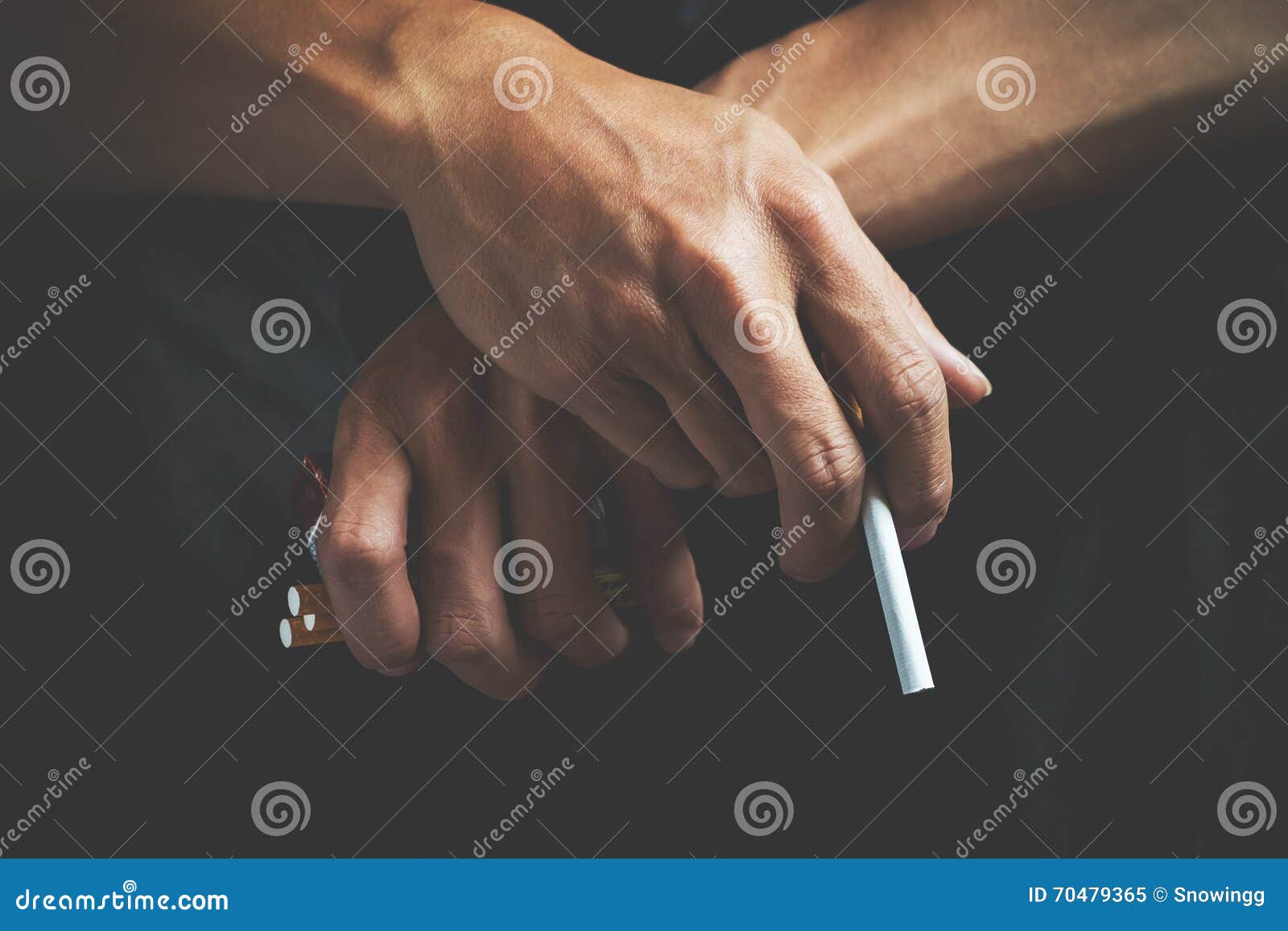 Cigarette addiction. Tobacco nicotine smoke. Unhealthy, danger, bad, narcotic habit. White filter. Health risk, cancer illness. Quit, stop toxic drug. Lifestyle concept. Pack in hand