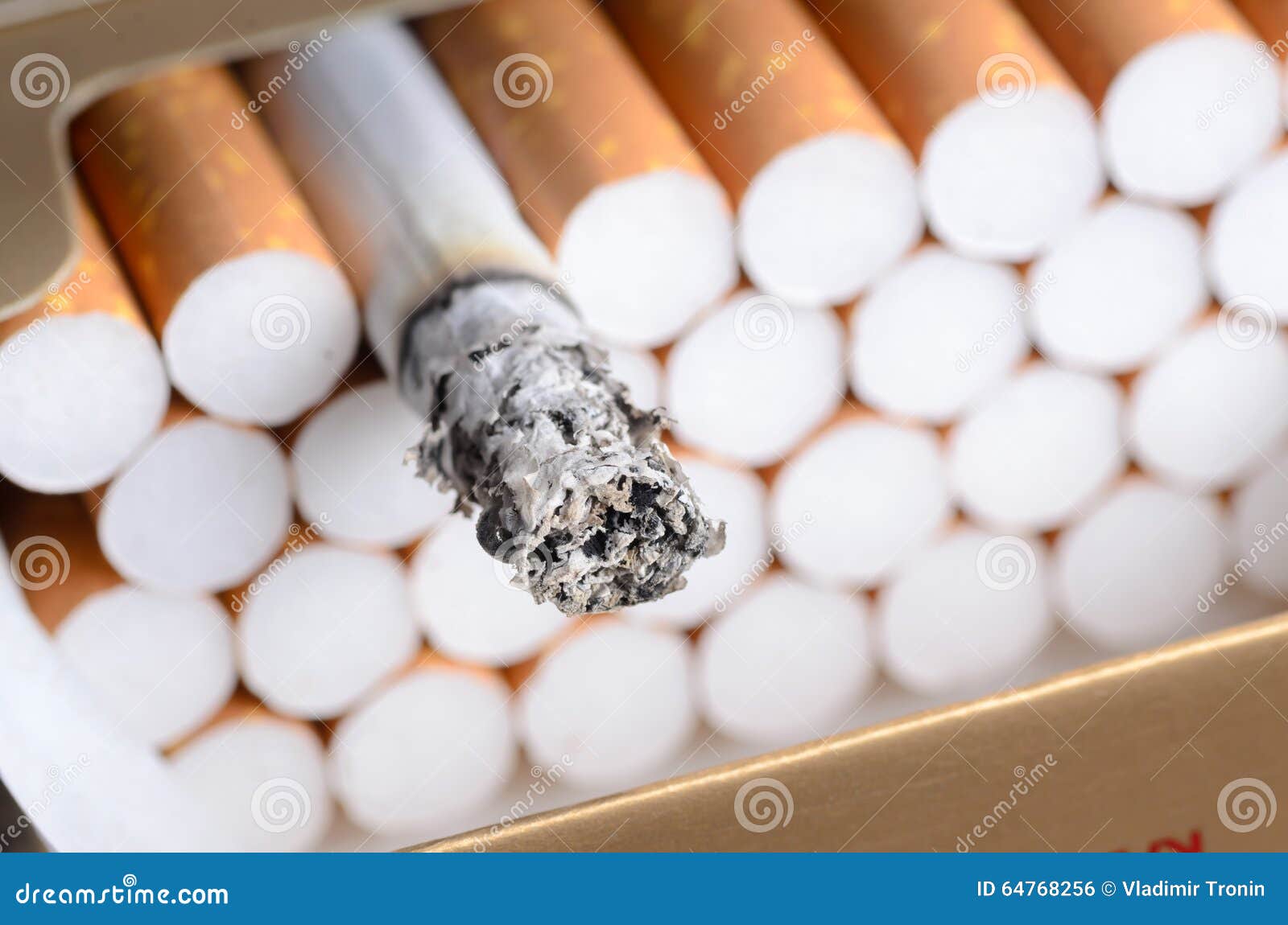 Cigarette with Brown Filter in the Box with Ash Stock Photo Image of
