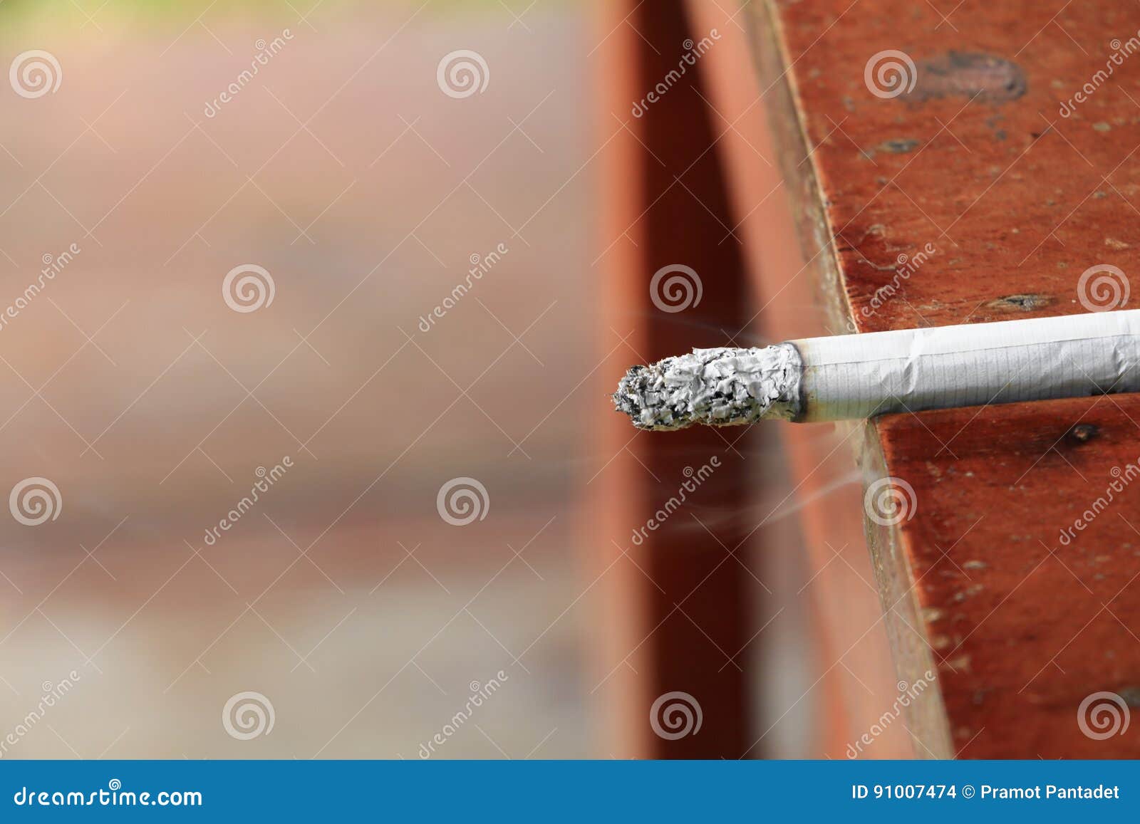 Cigarette Burn Selective Focus on a Wooden Table Stock Photo Image of