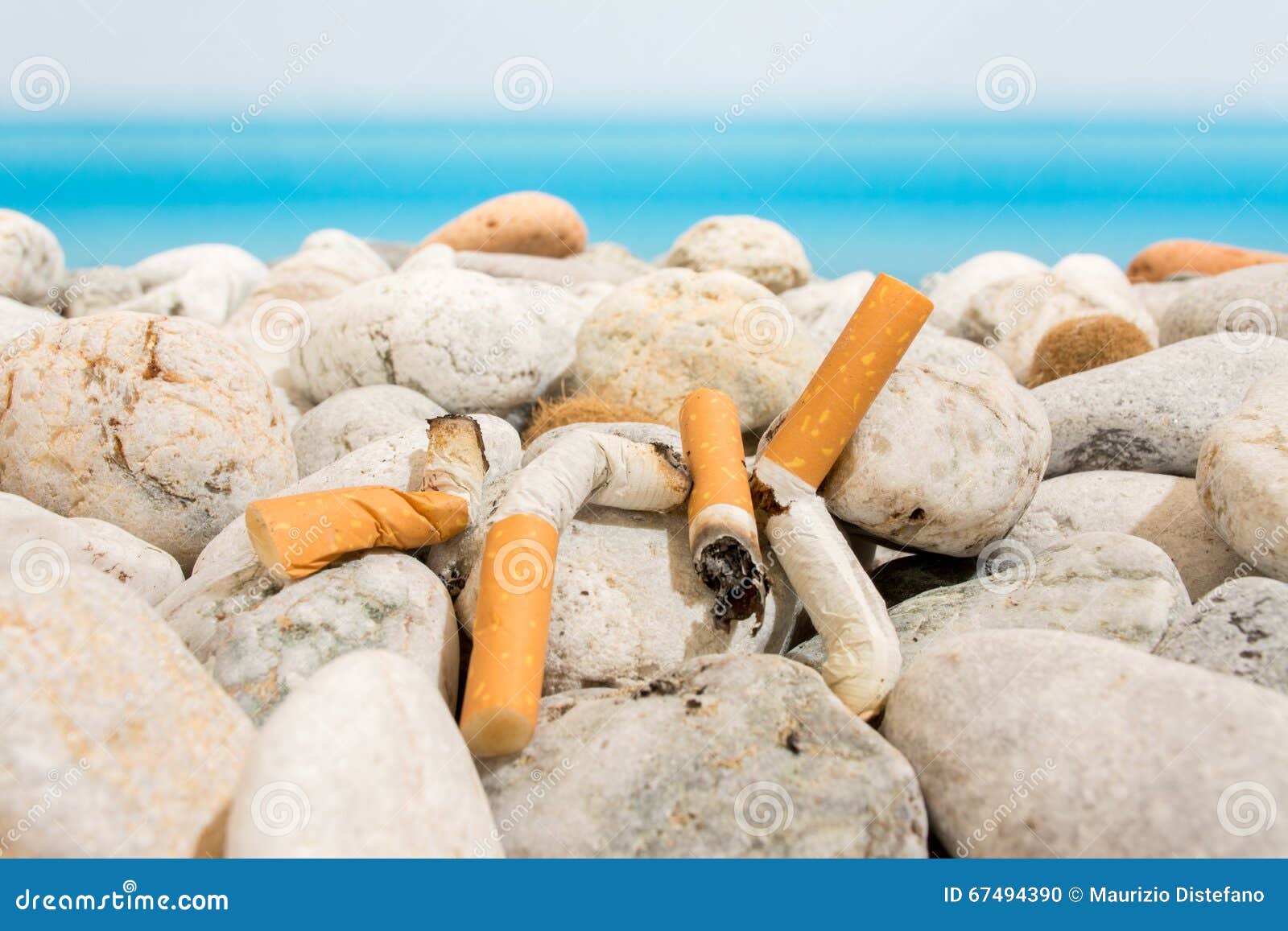 Cigarette butts on the stock photo. Image of pollute 67494390