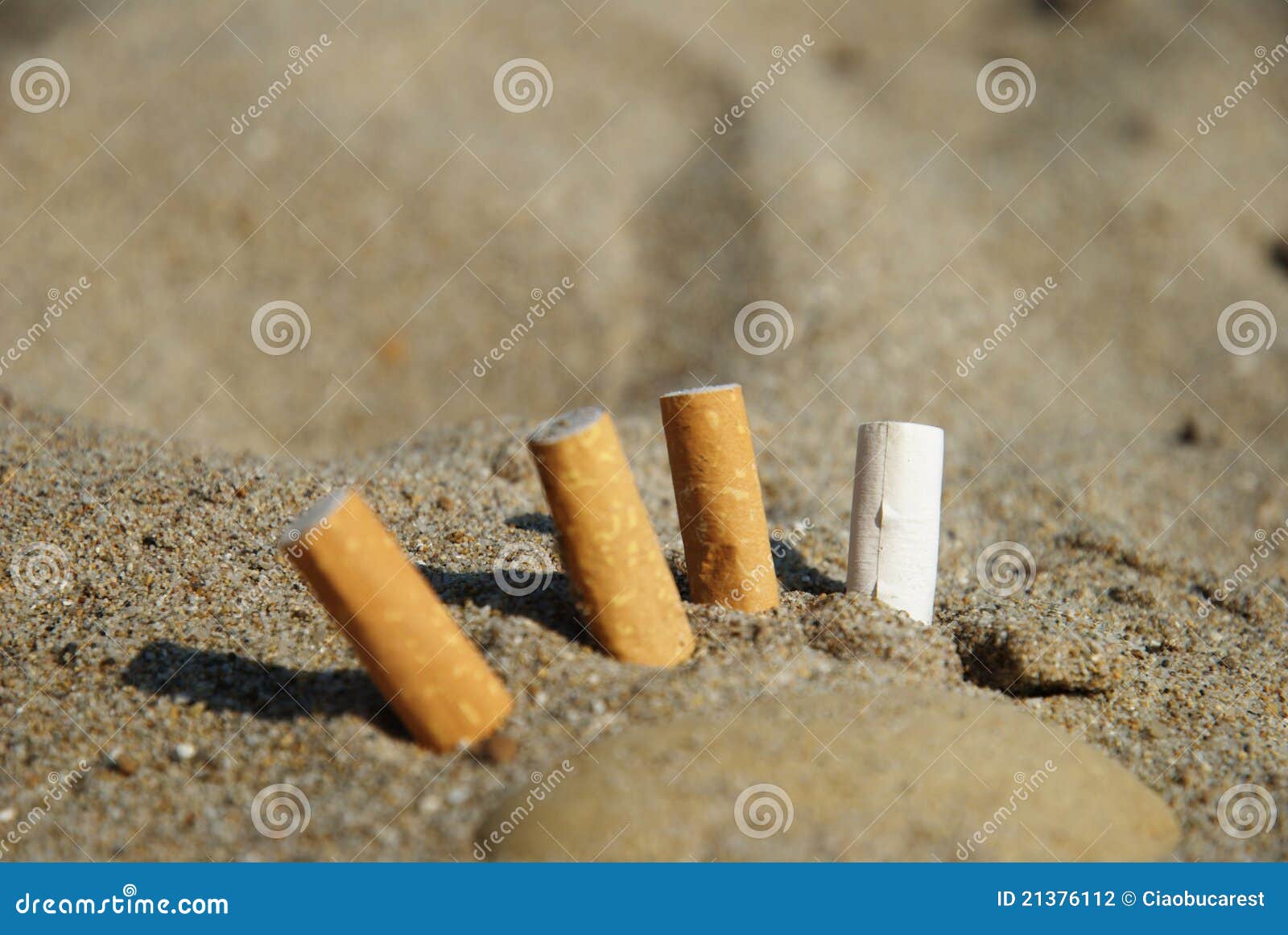 Cigarette Butts in the Sand Stock Photo Image of closeup, number