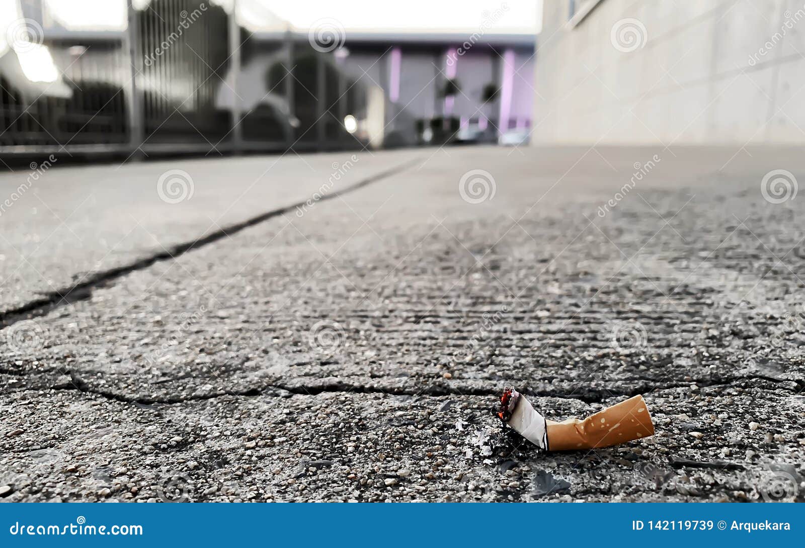 A cigarette on the floor stock image. Image of background 142119739