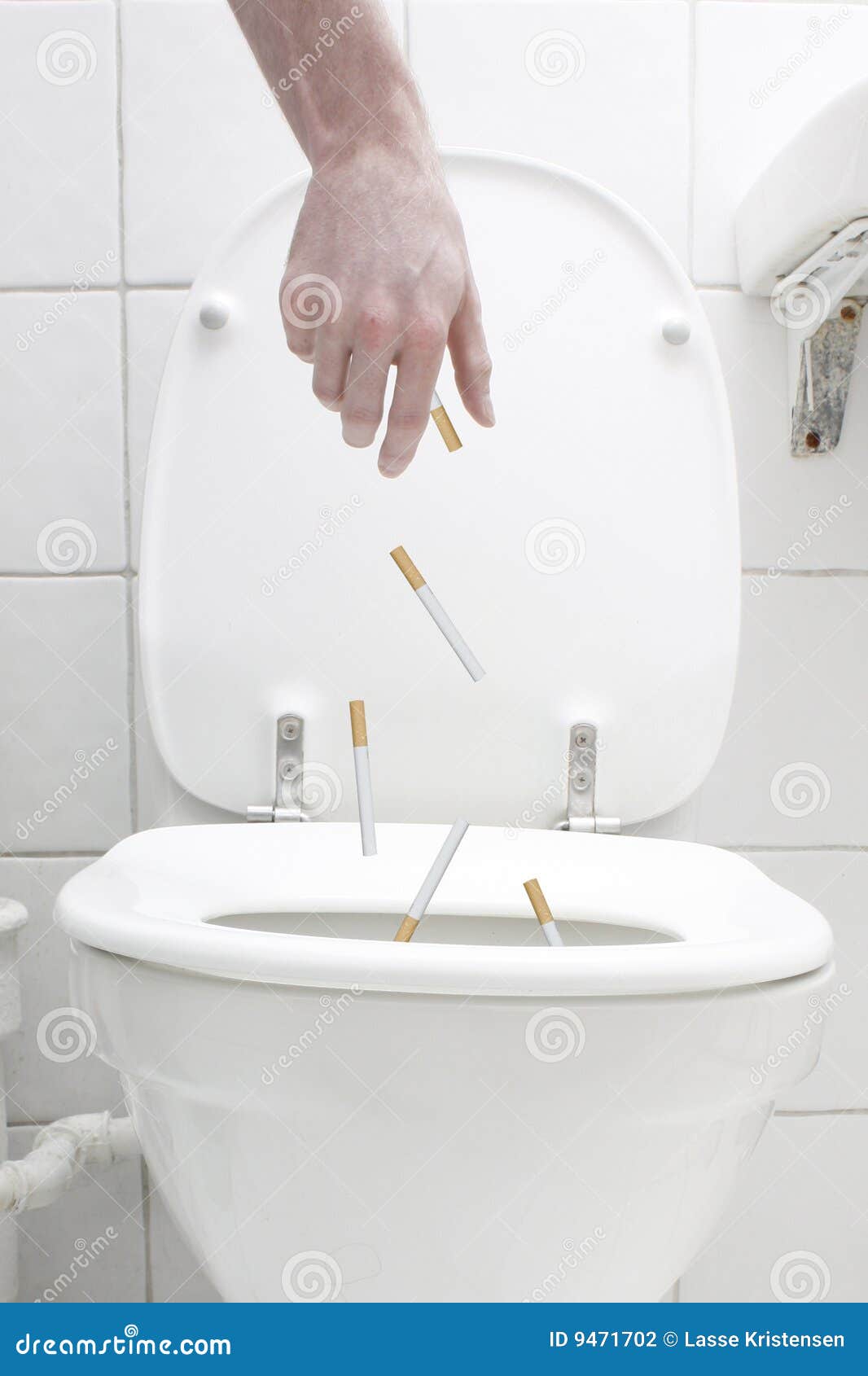 Cigarettes down the toilet stock photo. Image of addicting 9471702