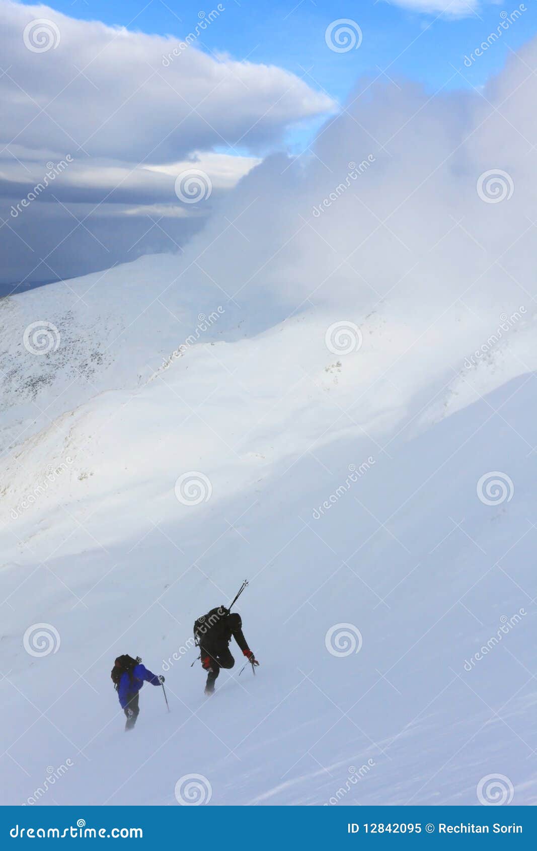 Cimbing alpinists. Alpinists climbing in Tarcu Mountains, Romania