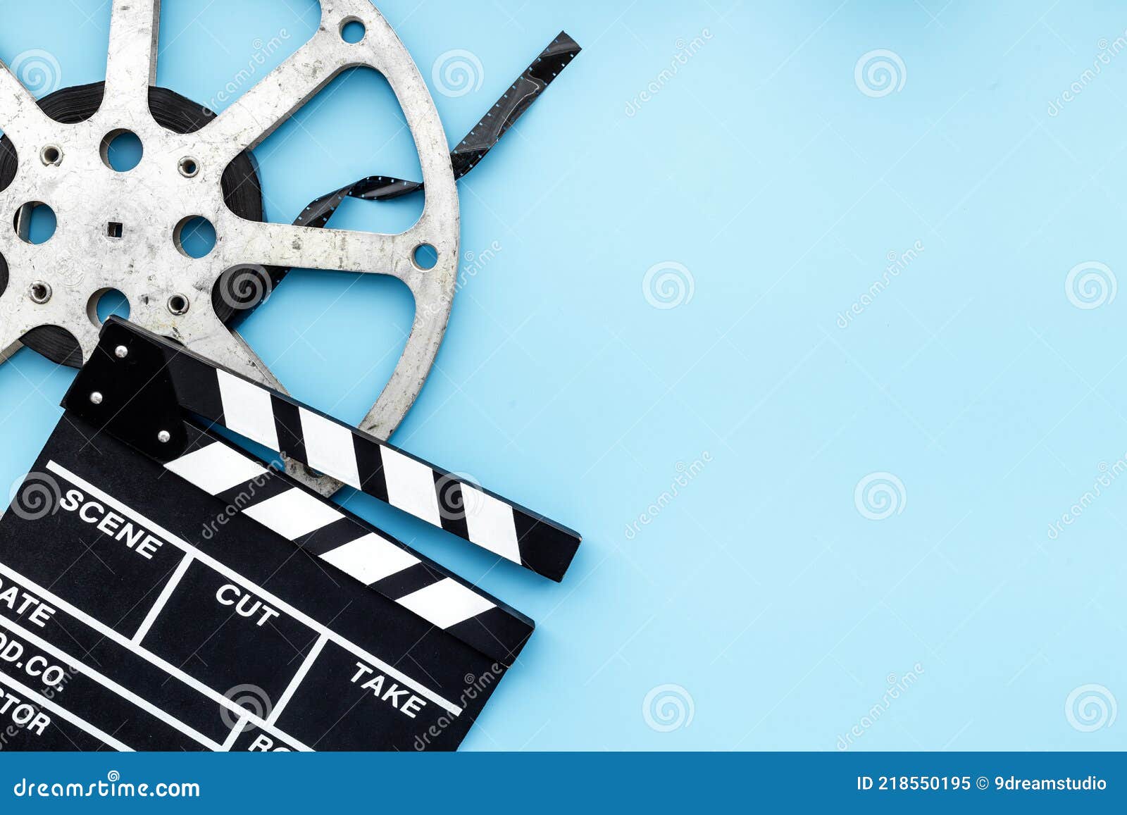Film movie Background - Clapperboard And Film Reels In Theater Stock Photo  by ©rfphoto 154863440