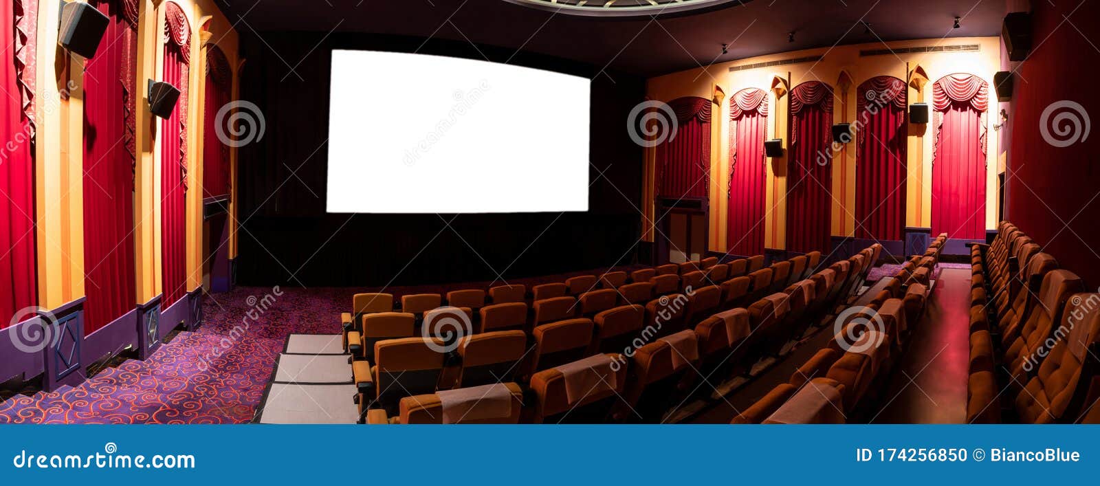 cinema theater showing empty white movie screen
