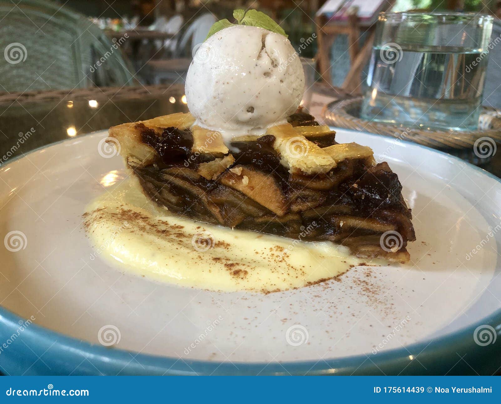 cinnamon apple pie. vanilla sauce. vanilla ice cream. top