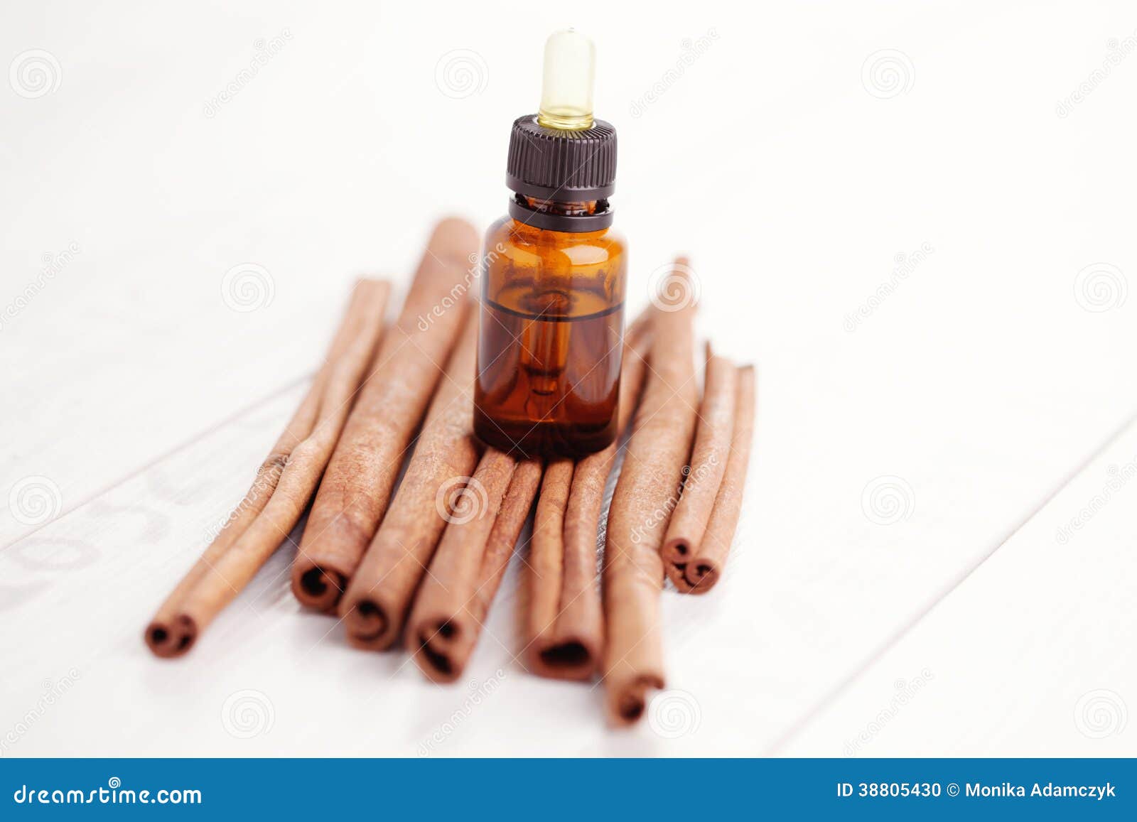 Cinnamon aromatherapy oil stock photo. Image of alternative 38805430