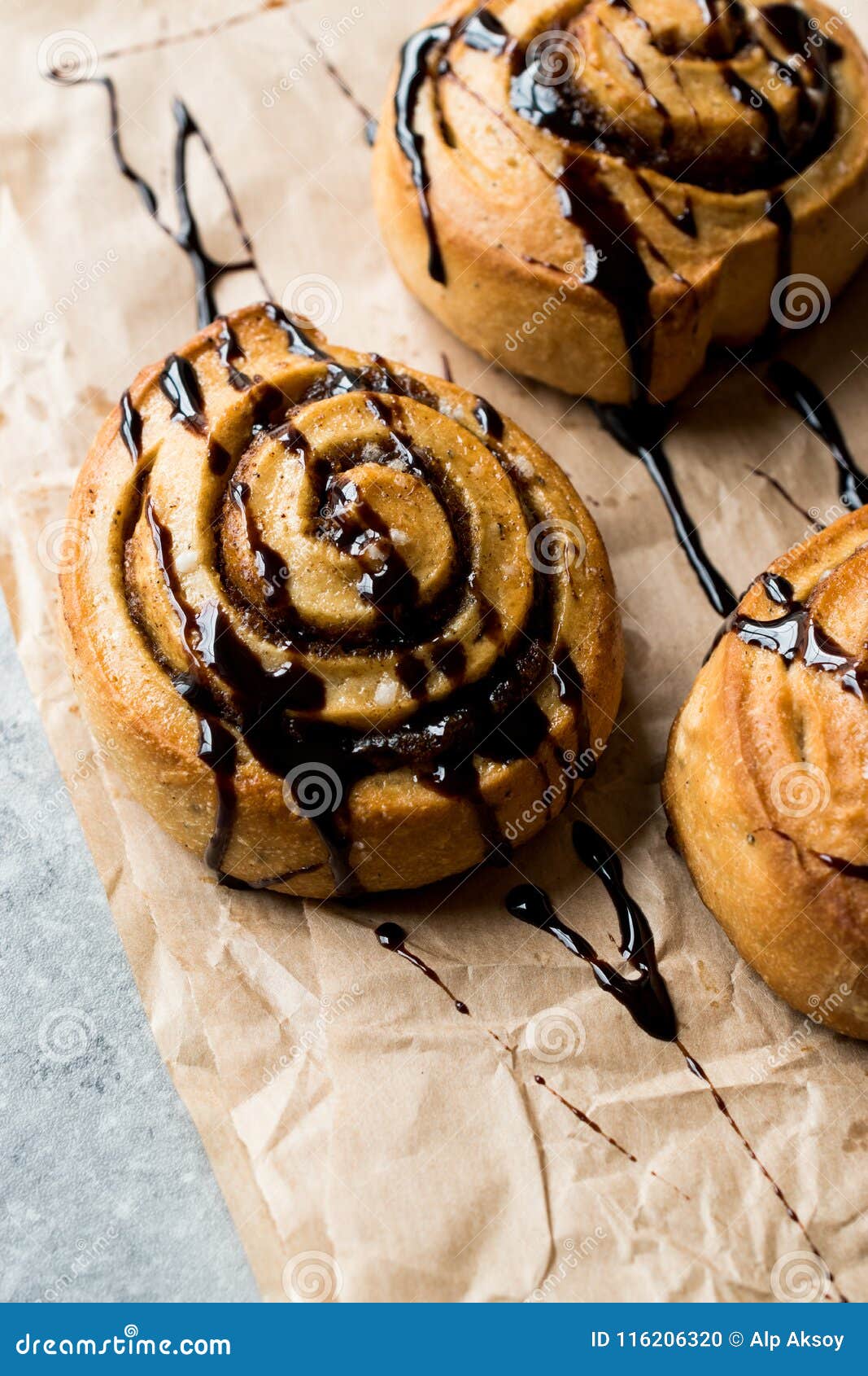 Cinnamon Rolls with Chocolate Sauce / Cinnamon Buns. Stock Photo