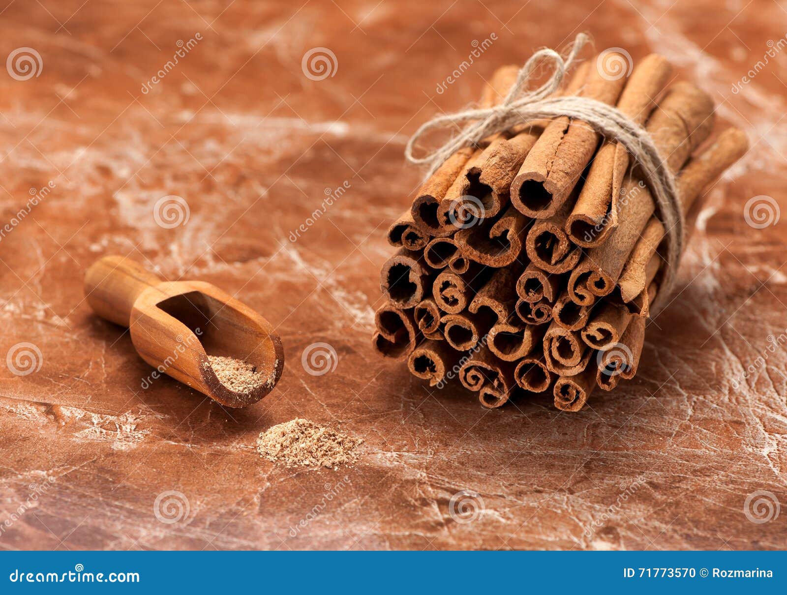 Cinnamon sticks and powder stock photo. Image of cook 71773570