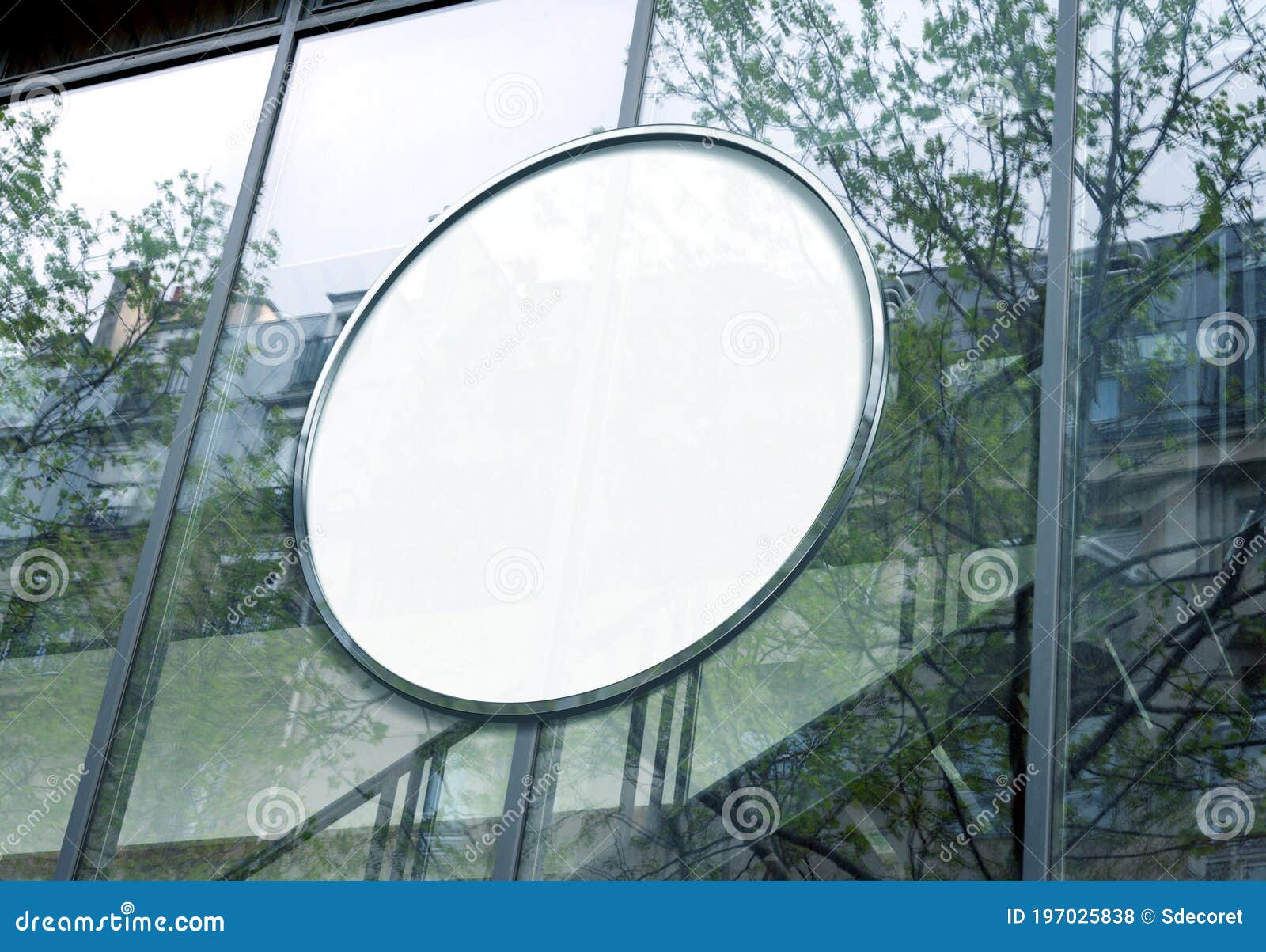 circular billboard mockup on glass window. round empty frame on company building frontage