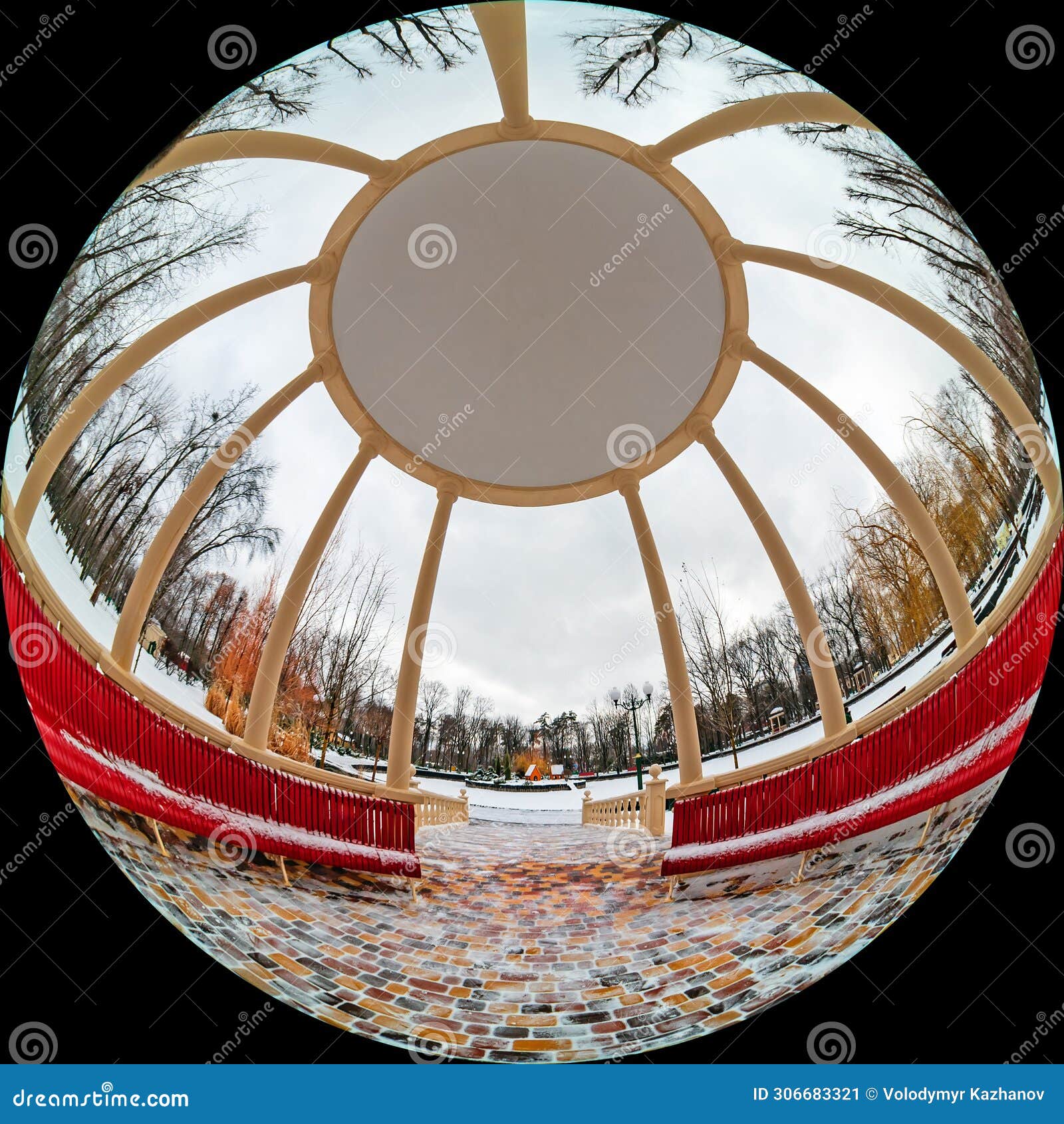 circular wide angle view from a large gazebo with columns and a park bench