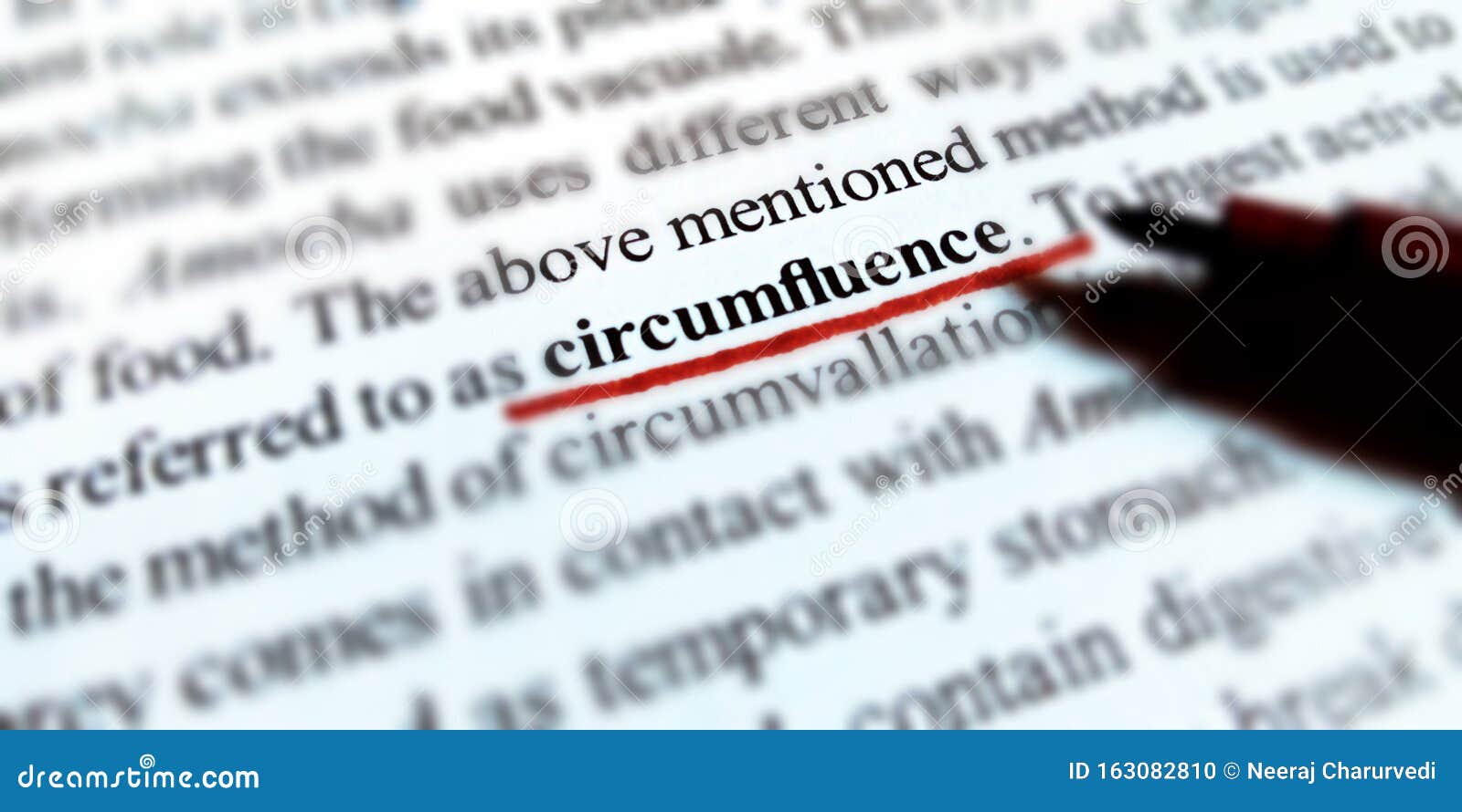 circumfluence text underlined in red color on white paper sheet