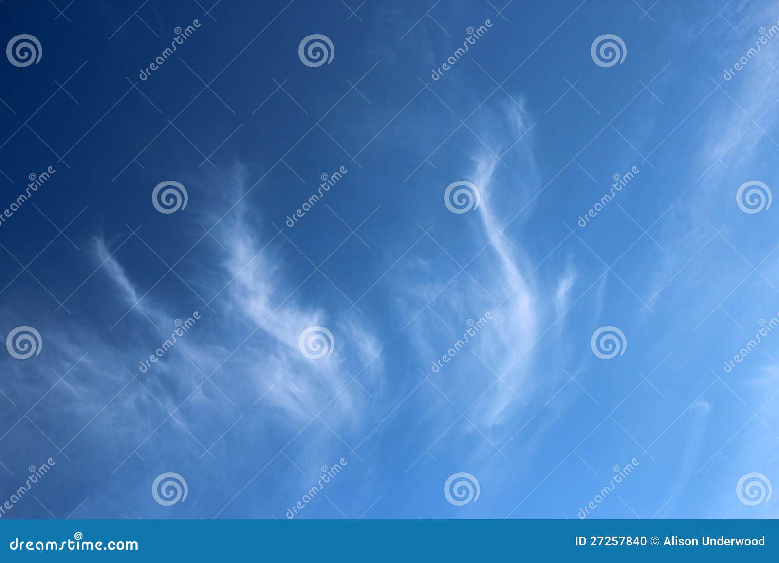 cirrus clouds in blue sky