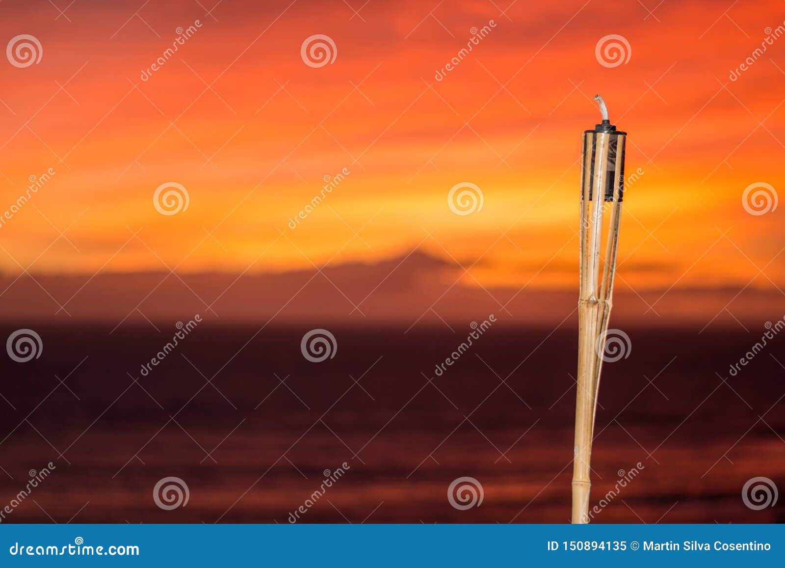 Citronella Oil Lamp Burning at Sunset Stock Image - Image of bamboo