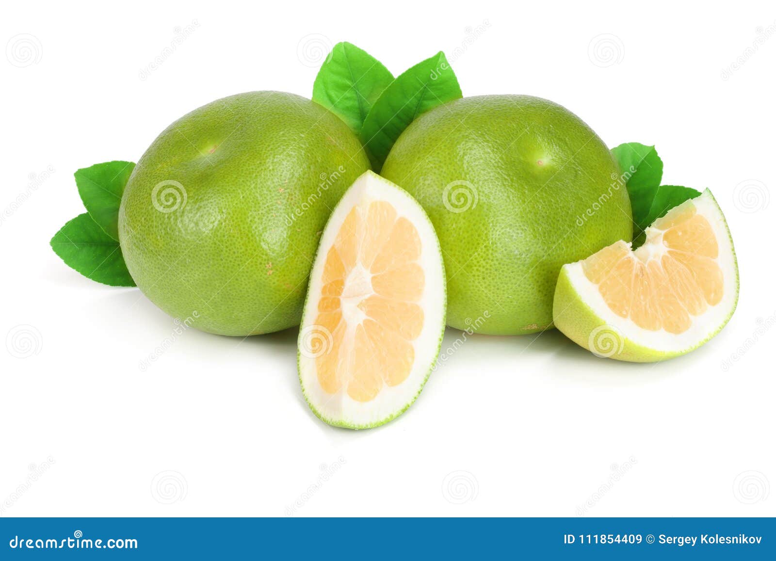 citrus sweetie or pomelit, oroblanco with slices and leaf  on white background close-up