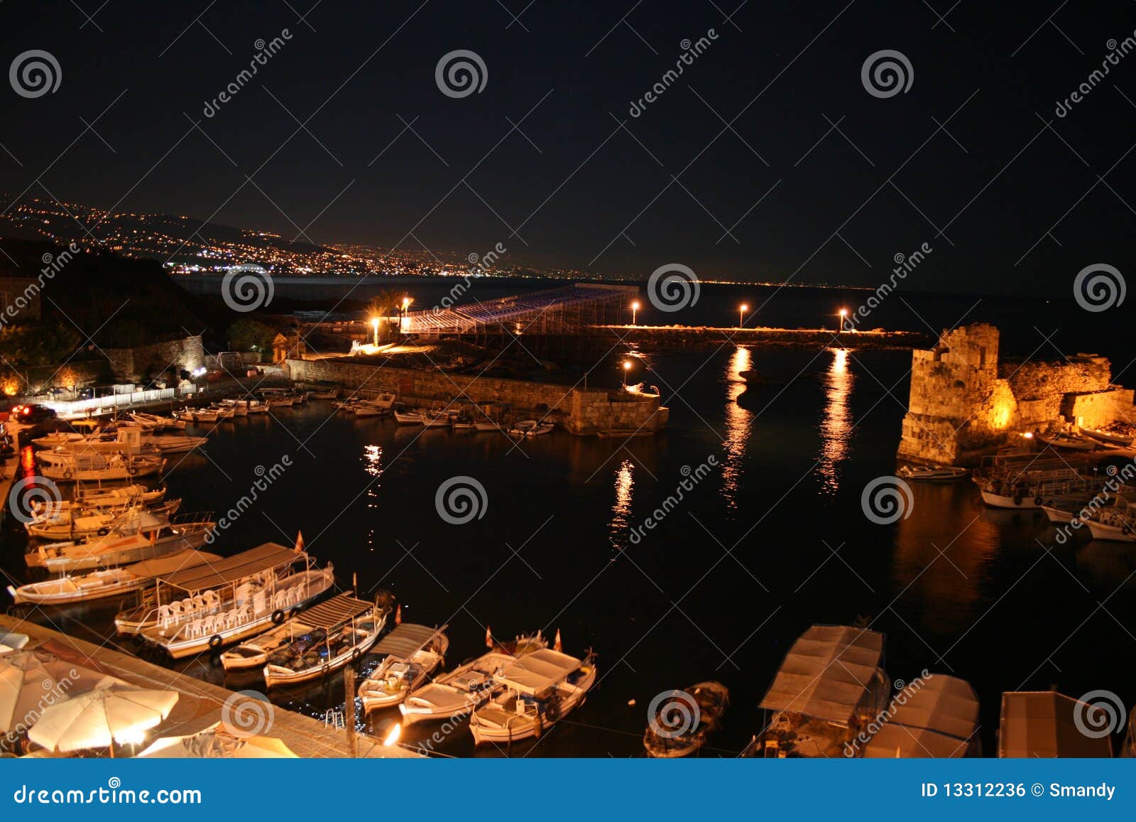 the city of byblos (jbeil) by night view over port