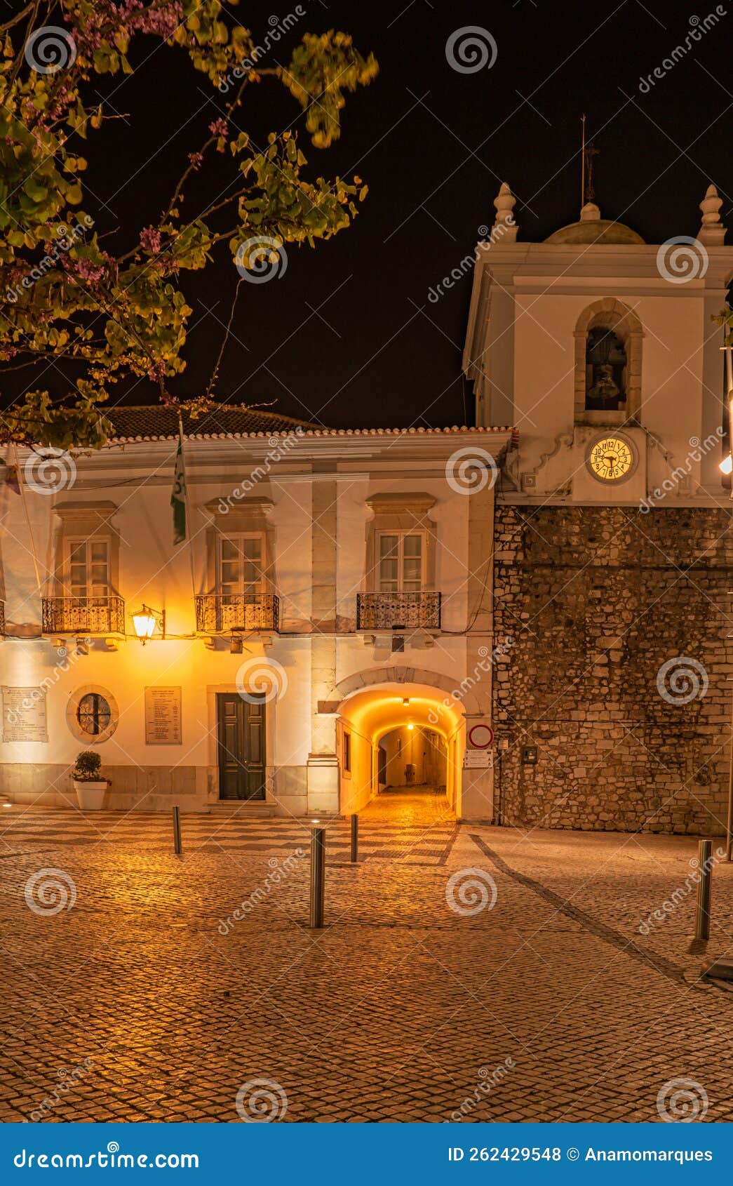 the city council in the old town of loule at the algarve, portugal. town hall illuminated at night