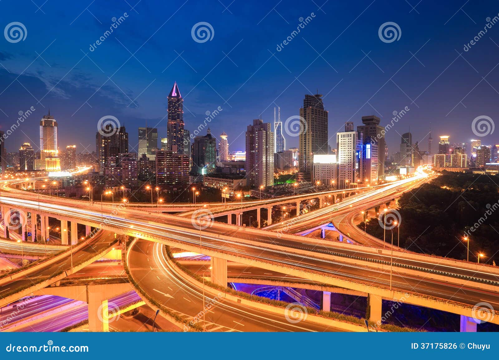 city highway traffic in nightfall