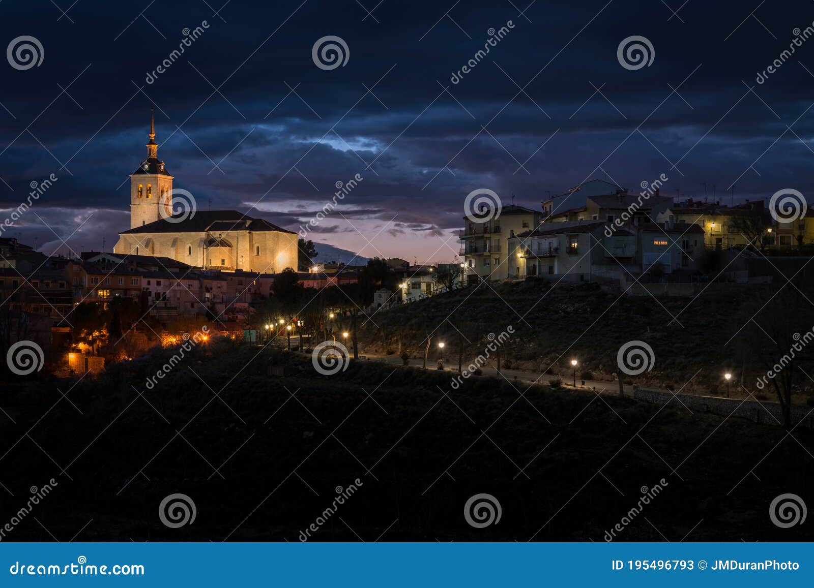 city landscape of colmenar de oreja illuminated at night, spain