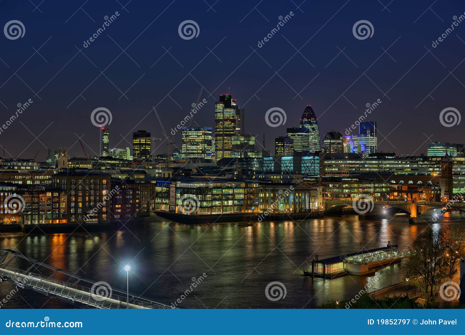 city of london over river thames, at nightfall