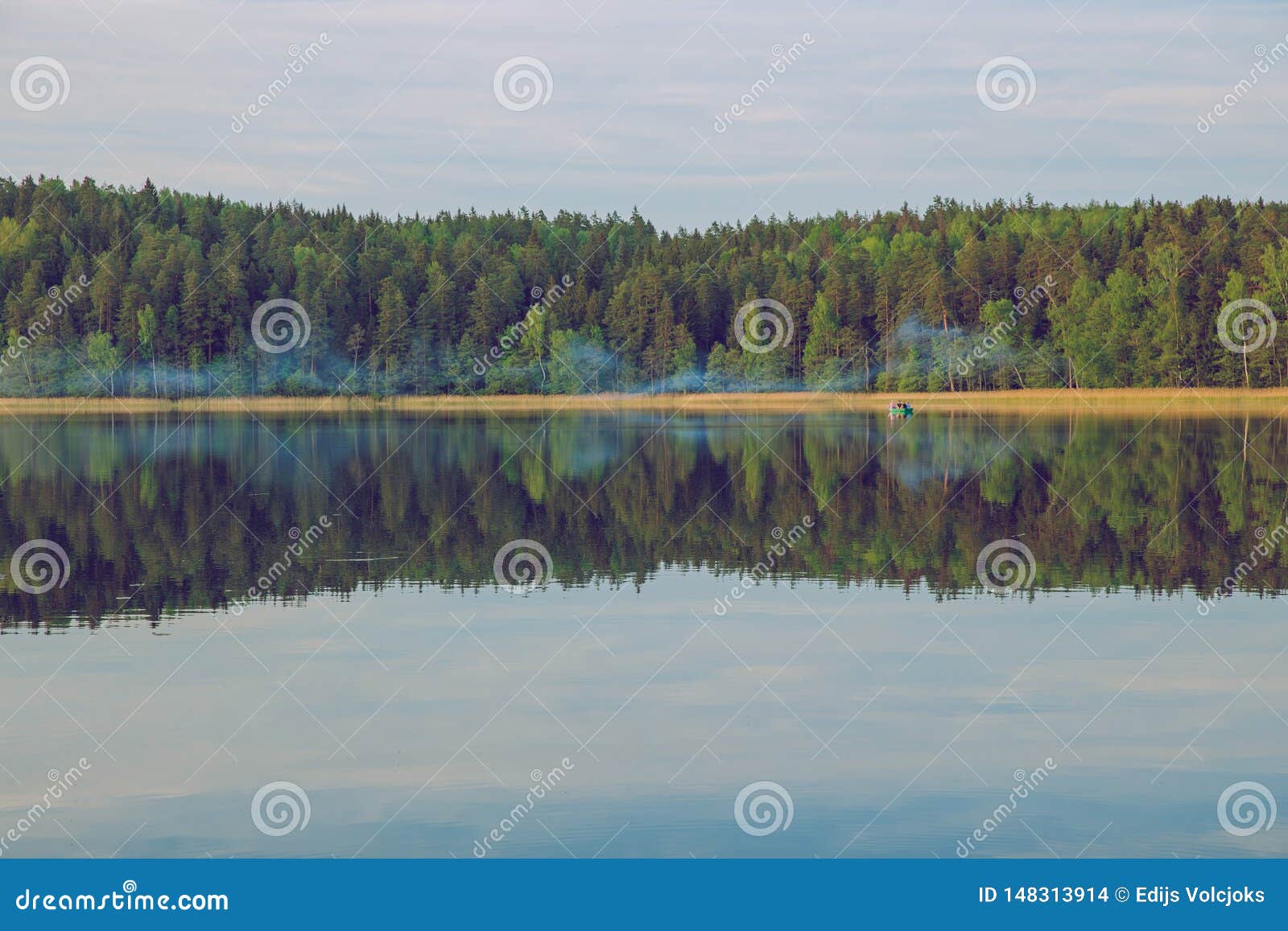 City Raiskums, Latvian Republic. View of the Lake with a Fishing Boat ...