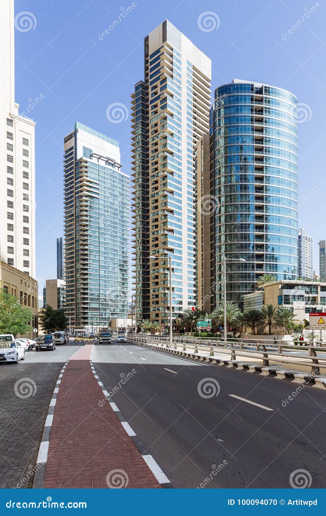 City Scape with Modern High-rise Buildings, Road and Blue Sky in Background  at Dubai Editorial Image - Image of asia, arabic: 100094070