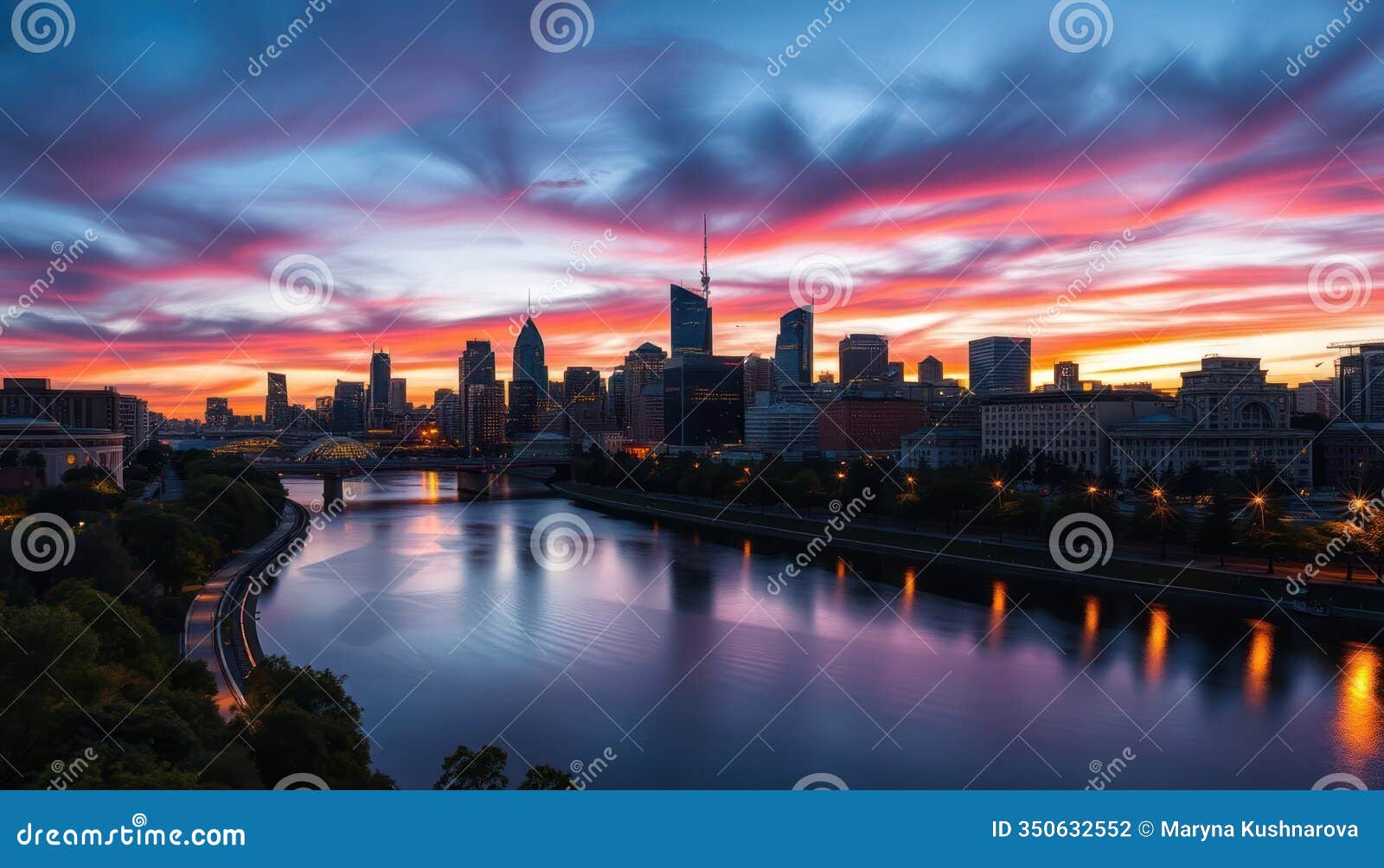 city skyline at dusk. skyscrapers, buildings stand along river. soft light, colorful sky reflect on water. urban landscape with