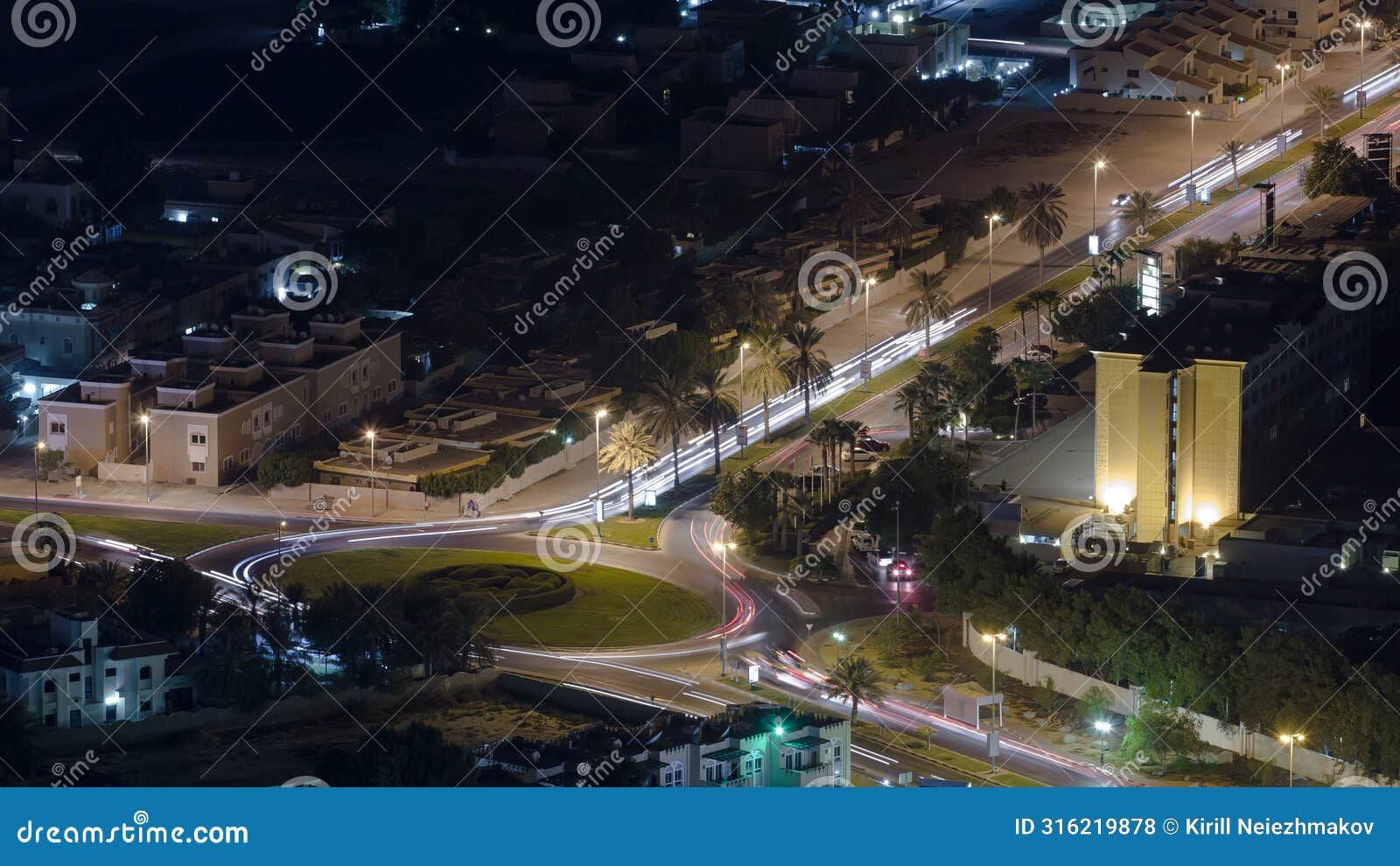 cityscape of ajman from rooftop night aerial timelapse