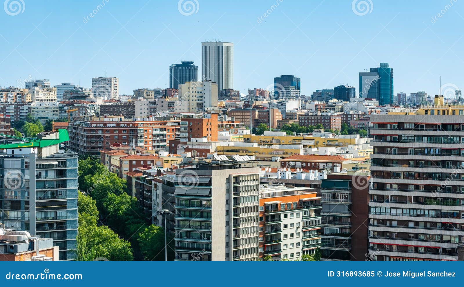 cityscape of the city of madrid in a drone view with residential and office buildings, spain.