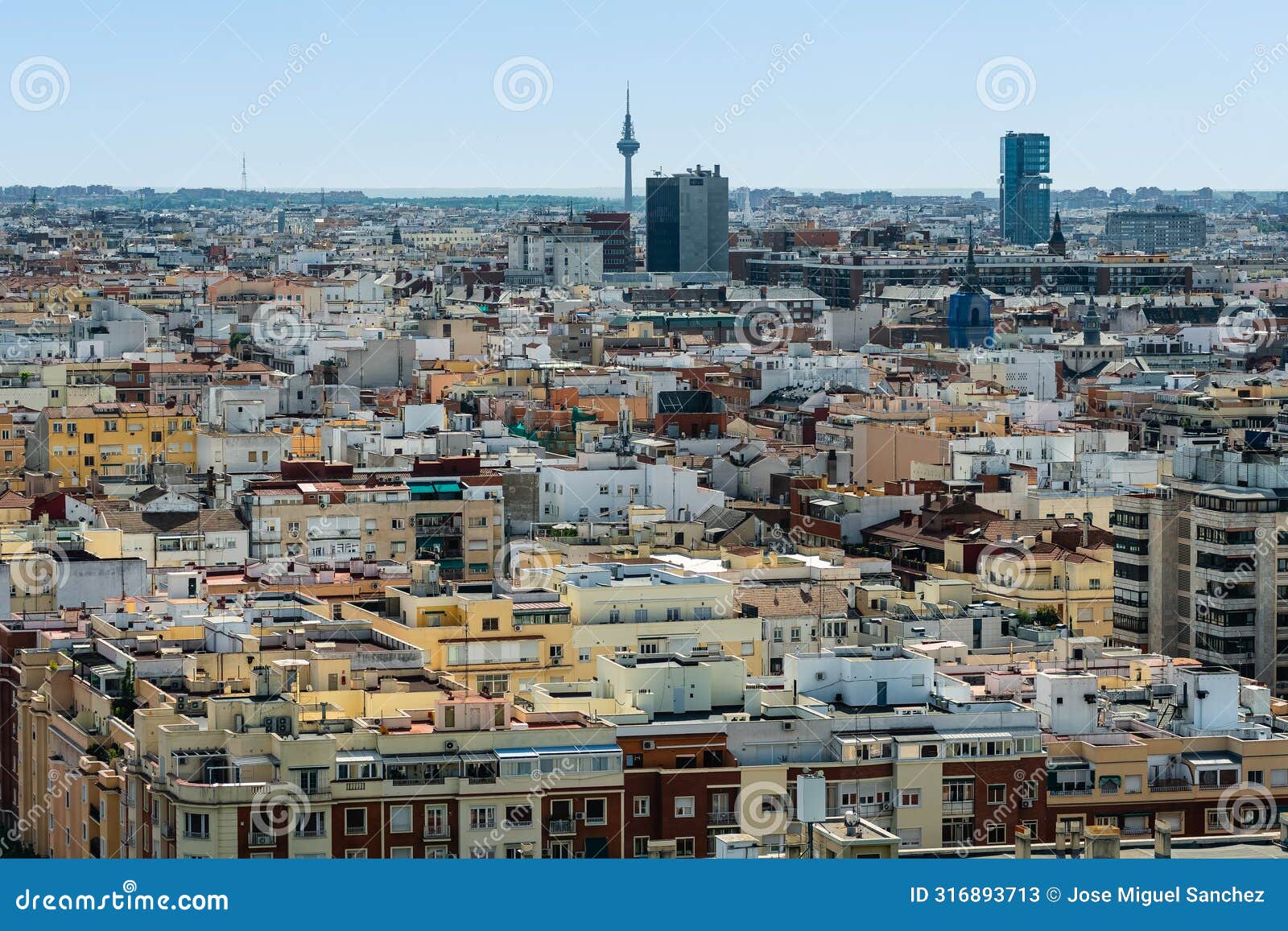 cityscape of the city of madrid in a drone view with residential and office buildings, spain.