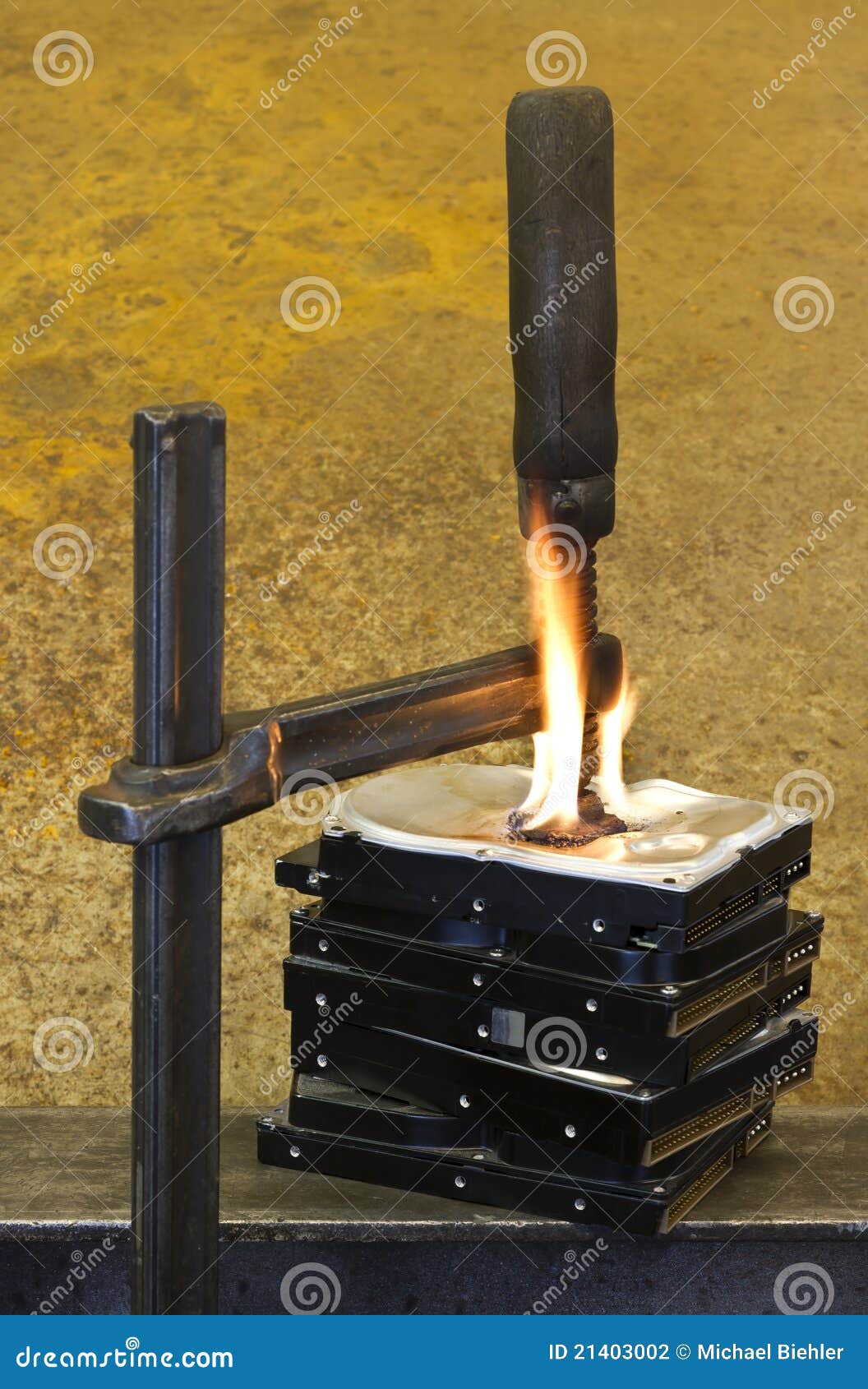 Clamp Pressing On Burning Stack Of Hard Drives Stock Photo Image of